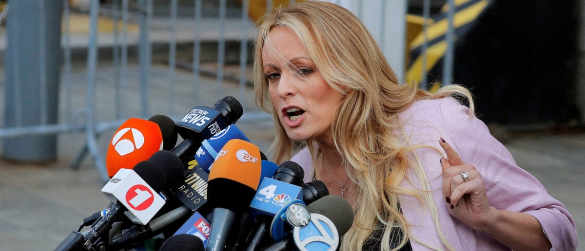 FILE PHOTO: Adult-film actress Stephanie Clifford, also known as Stormy Daniels, speaks as she departs federal court in the Manhattan borough of New York City, New York, U.S., April 16, 2018. REUTERSLucas Jackson/File Photo