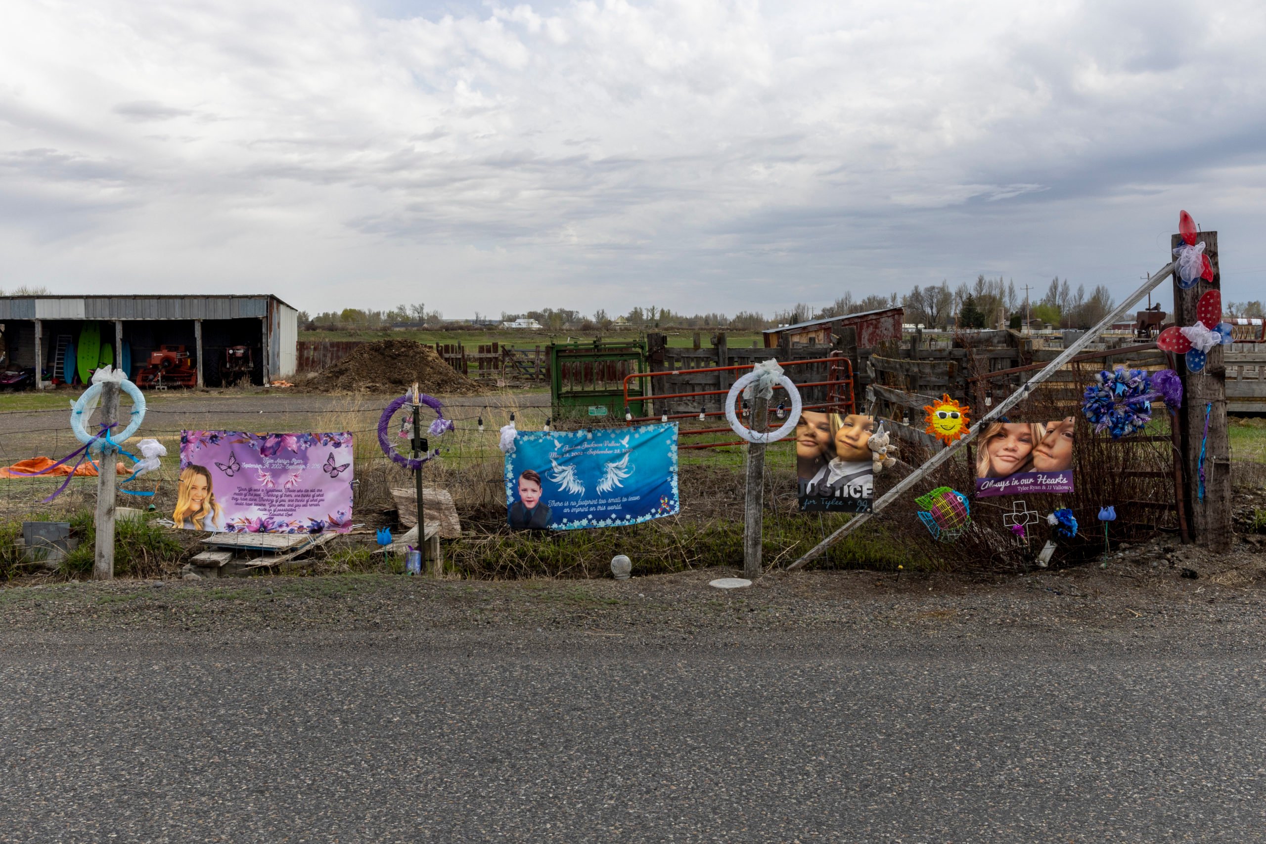 REXBURG, IDAHO - MAY 10: Banners showing Tylee Ryan and her brother J.J. Vallow are seen on a fence set up as a memorial near where her body was found on May 10, 2023 in Rexburg, Idaho. Lori Vallow Daybell faces charges of murder, conspiracy and grand theft in connection to the deaths of two of her children — Tylee Ryan and J.J. Vallow — as well as Tammy Daybell, the previous wife of her husband Chad Daybell. (Photo by Natalie Behring/Getty Images)