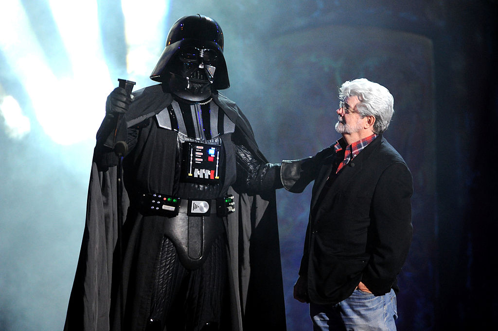 UNIVERSAL CITY, CA - OCTOBER 15: Director George Lucas (R) and Darth Vader onstage during Spike TV's "Scream 2011" at Universal Studios on October 15, 2011 in Universal City, California. (Photo by Jeff Kravitz/FilmMagic)