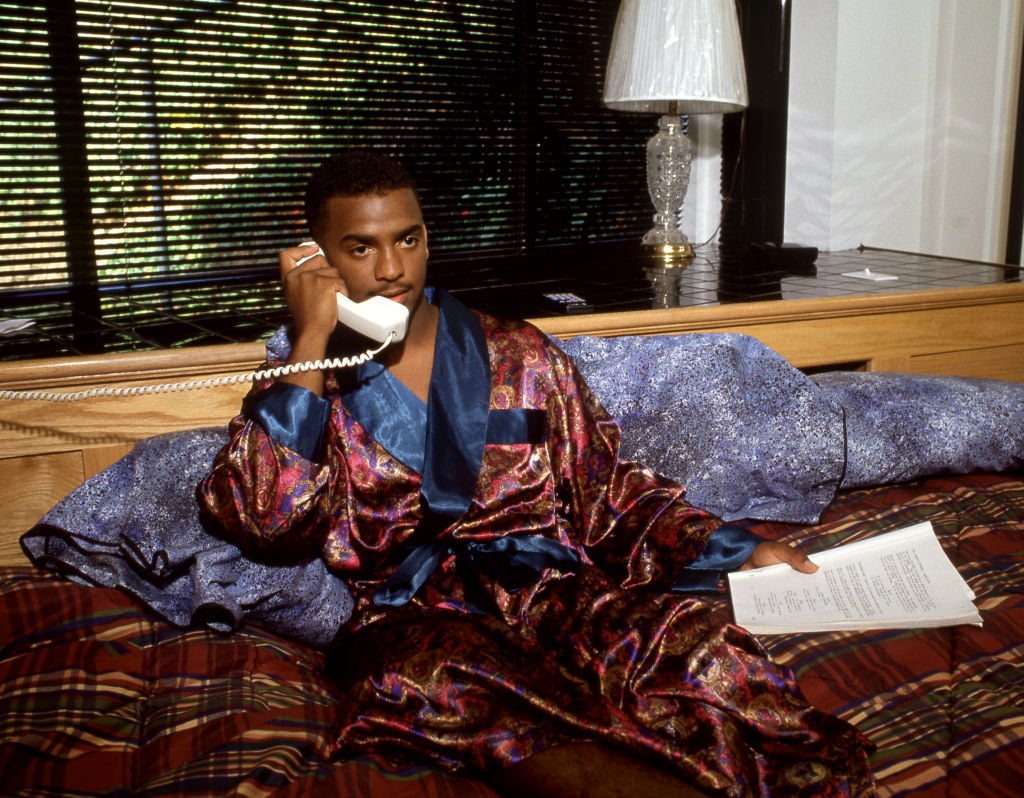 American actor, director, and television personality Alfonso Ribeiro, talks on the phone on the set of horror and sci-fi film Ticks in July 1992 in Los Angeles, California. (Photo by Bill Nation/Sygma via Getty Images)