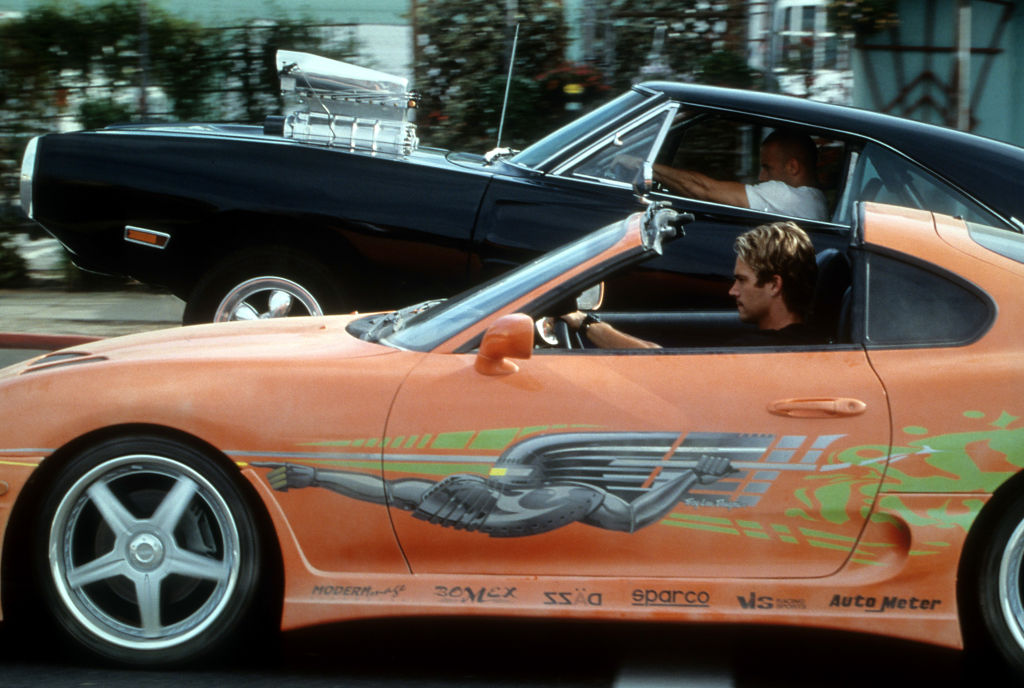 Vin Diesel and Paul Walker racing against each other in a scene from the film 'The Fast And The Furious', 2001. (Photo by Universal/Getty Images)