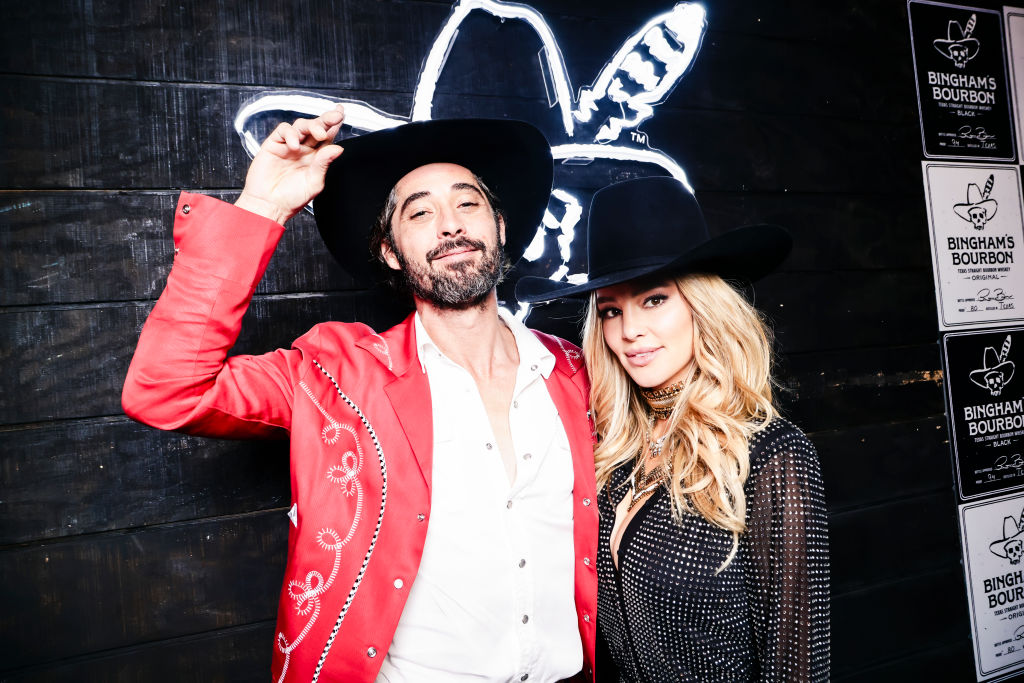 LAS VEGAS, NEVADA - DECEMBER 07: (L-R) Ryan Bingham and Hassie Harrison attend Bingham's Bourbon NFR After Party at Inspire at the Wynn on December 07, 2023 in Las Vegas, Nevada. (Photo by Greg Doherty/Getty Images for Bingham's Bourbon)