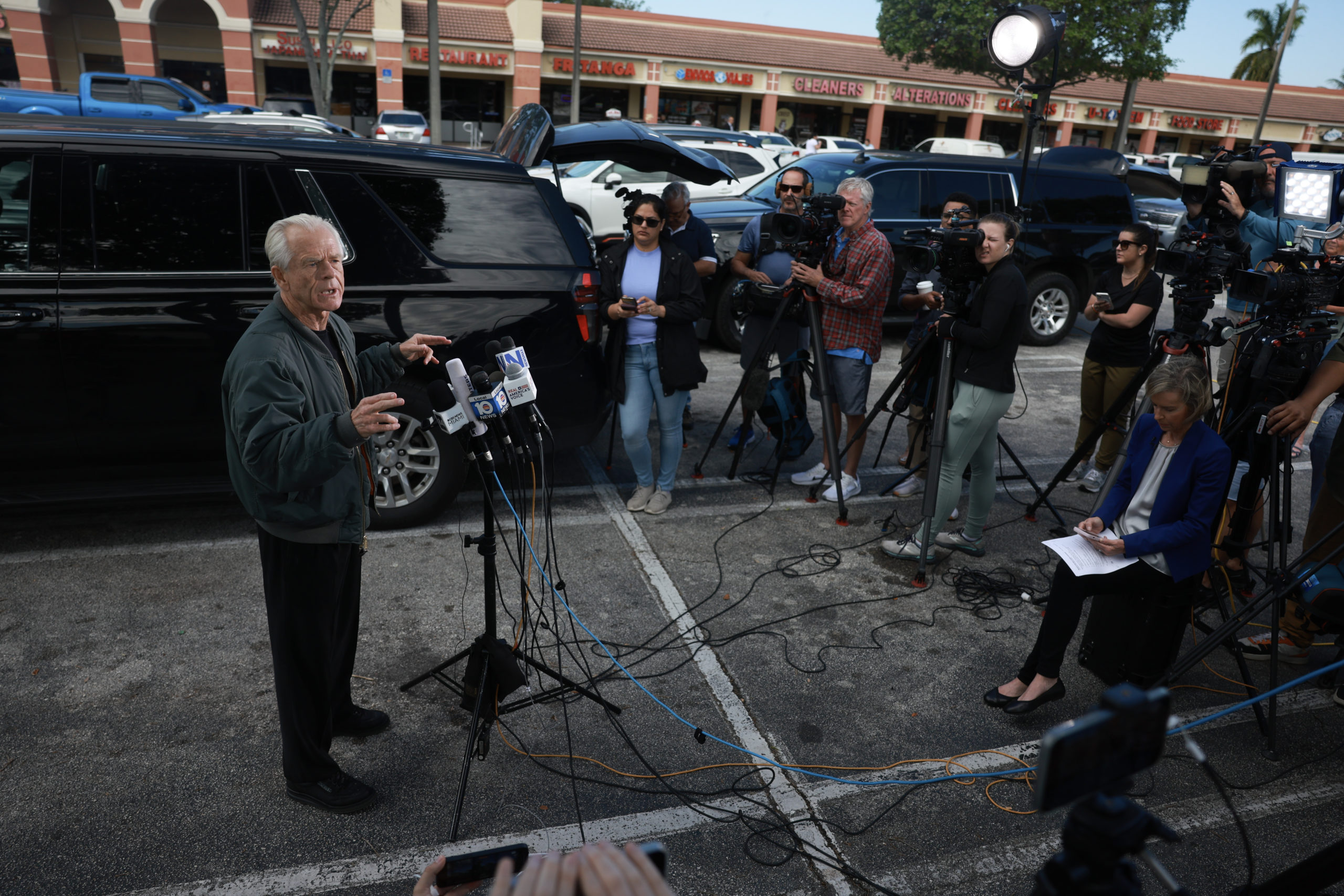 Former Donald Trump adviser Peter Navarro holds a press conference before turning himself in to a federal prison on March 19, 2024, in Miami, Florida. Mr. Navarro, who was convicted of contempt of Congress last year, surrendered at a federal Bureau of Prisons facility to begin serving his four-month sentence after speaking to the media. (Photo by Joe Raedle/Getty Images)