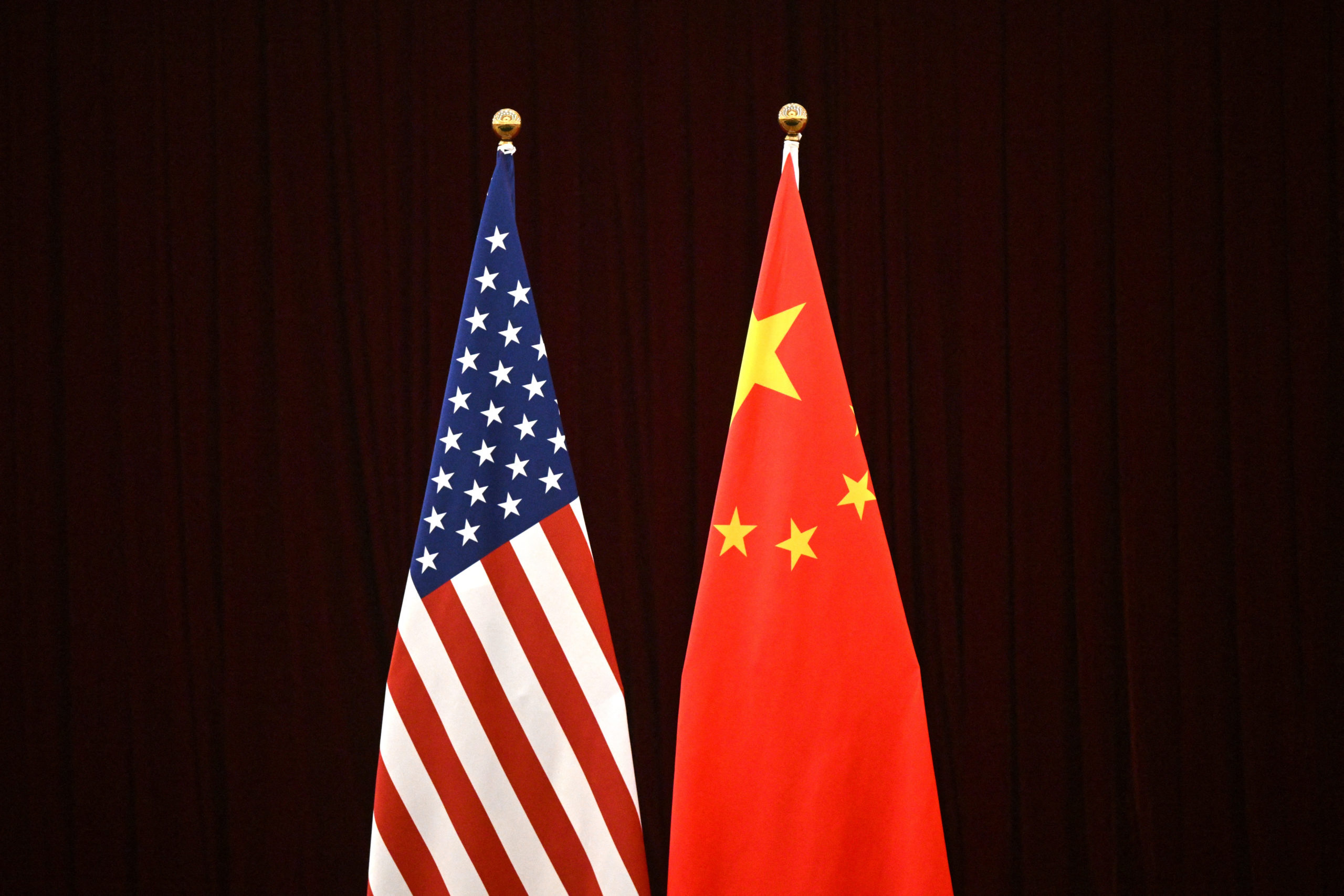 This photo shows a gerenal view of China's and USA's flags during a meeting between US Treasury Secretary Janet Yellen and China's Vice Premier He Lifeng at the Guangdong Zhudao Guest House in the southern Chinese city of Guangzhou, on April 5, 2024. (Photo by PEDRO PARDO/AFP via Getty Images)