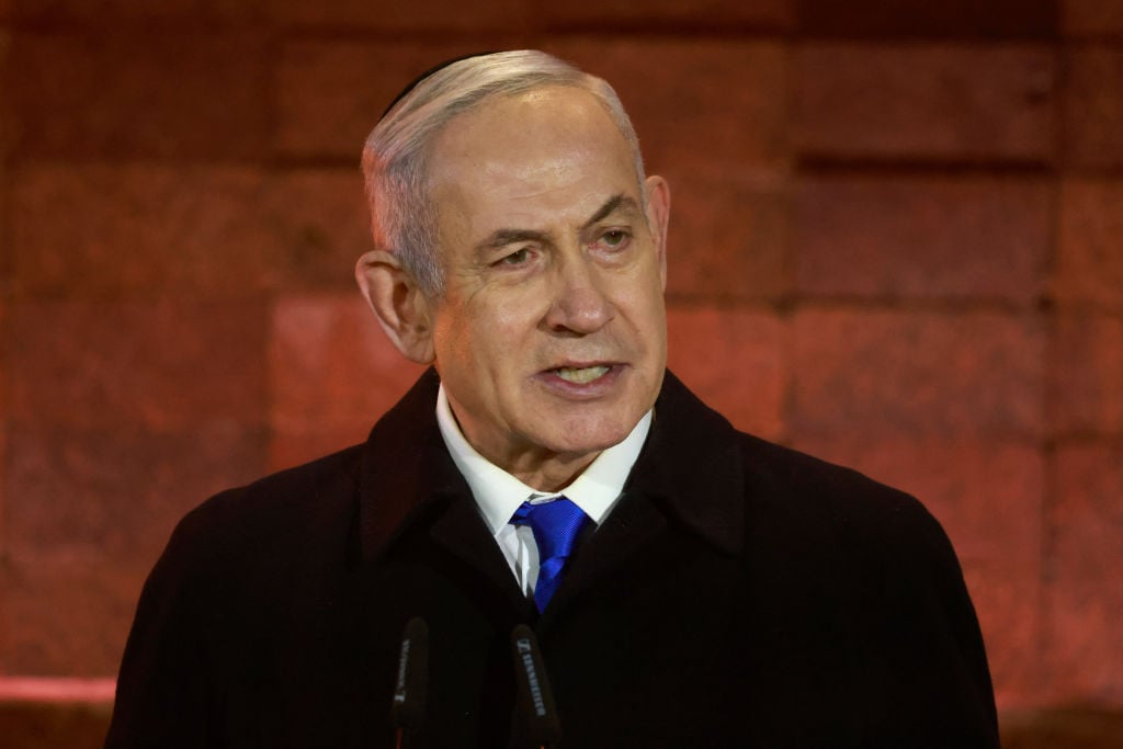 Israel's Prime Minister Benjamin Netanyahu speaks during a ceremony marking Holocaust Remembrance Day for the six million Jews killed during World War II, at the Yad Vashem Holocaust Memorial in Jerusalem on May 5, 2024. (Photo by Menahem Kahana / AFP) (Photo by MENAHEM KAHANA/AFP via Getty Images)