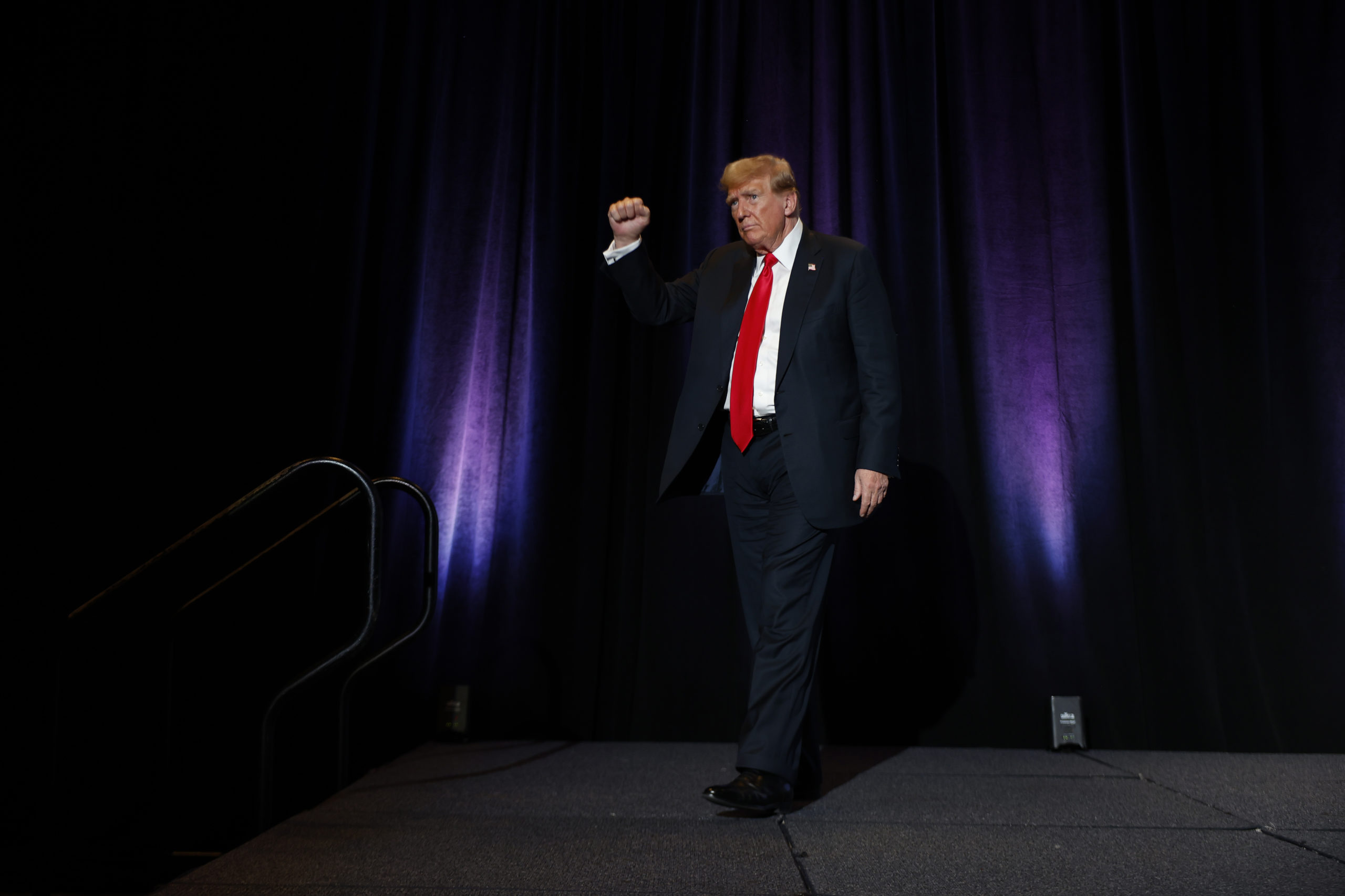 Former U.S. President and Republican presidential candidate Donald Trump steps off stage after addressing the Libertarian Party National Convention at the Washington Hilton. (Photo by Chip Somodevilla/Getty Images)