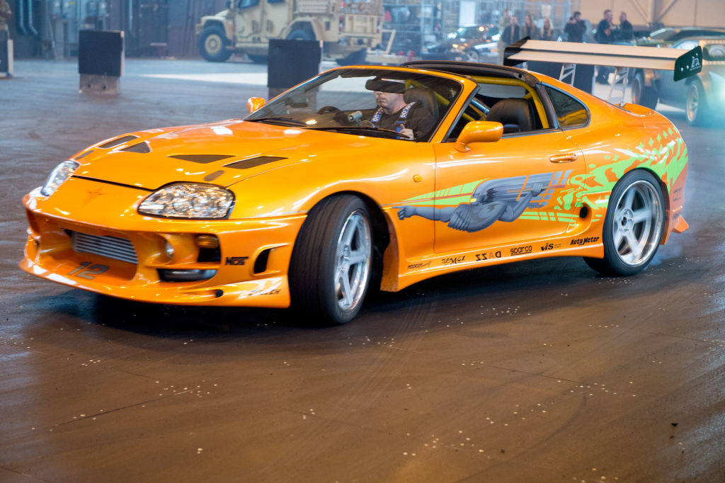 UNITED KINGDOM - SEPTEMBER 21: A 1994 Toyota Supra MK IV used on screen by Paul Walker in The Fast and the Furious (2001) during the 'Fast & Furious Live' media launch day event which featured the most screen used Fast and Furious cars ever in one place, on September 21, 2017 at the Fast & Furious 'Fast Camp' live rehersal space in Leicestershire, England. (Photo by Ollie Millington/Getty Images)