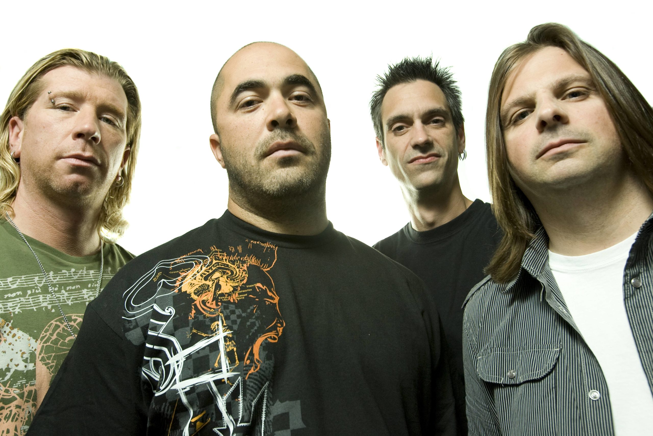 Posed studio group portrait of American rock band Staind. Left to right are Jon Wysocki, Aaron Lewis, Johnny April and Mike Mushok in New York on July 14 2008. (Photo by Nigel Crane/Redferns)
