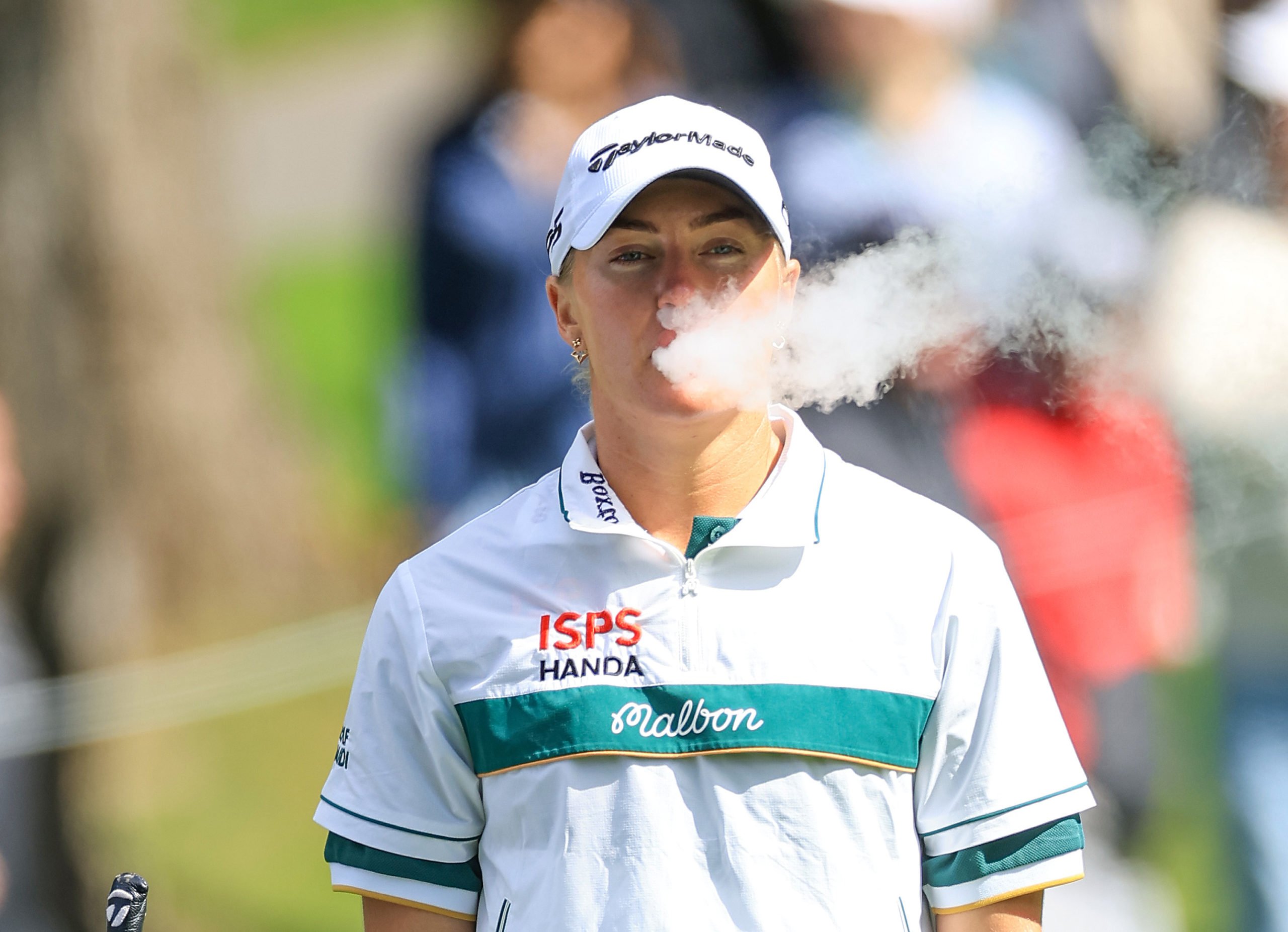SAMMAMISH, WASHINGTON - JUNE 23: Charley Hull of England smokes a vape on the second hole during the final round of the KPMG Women's PGA Championship at Sahalee Country Club on June 23, 2024 in Sammamish, Washington. (Photo by David Cannon/Getty Images)