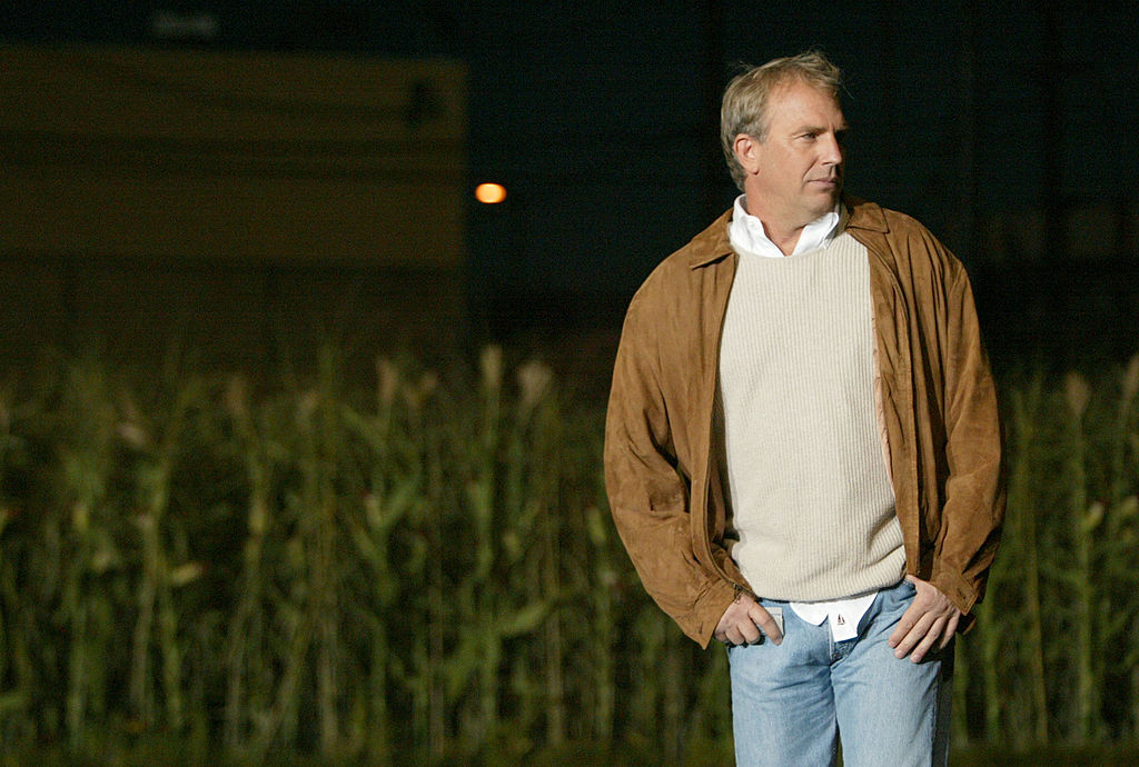 Kevin Costner emerges from rows of cornstalks, as part of the celebration for the DVD release of the "Field of Dreams" Two-Disc Anniversary Edition. The event, thrown by Universal Studios Home Video, was held at the West Hollywood Park in Hollywood, California on June 9, 2004 and reunited cast and filmmakers from "Field of Dreams." (Photo by Chris Polk/FilmMagic) Getty Images