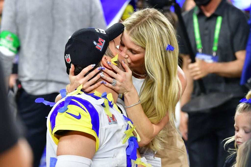 Los Angeles Rams' quarterback Matthew Stafford kisses wife Kelly Hall after winning Super Bowl LVI between the Los Angeles Rams and the Cincinnati Bengals at SoFi Stadium in Inglewood, California, on February 13, 2022. (Photo by Frederic J. Brown / AFP) (Photo by FREDERIC J. BROWN/AFP via Getty Images)