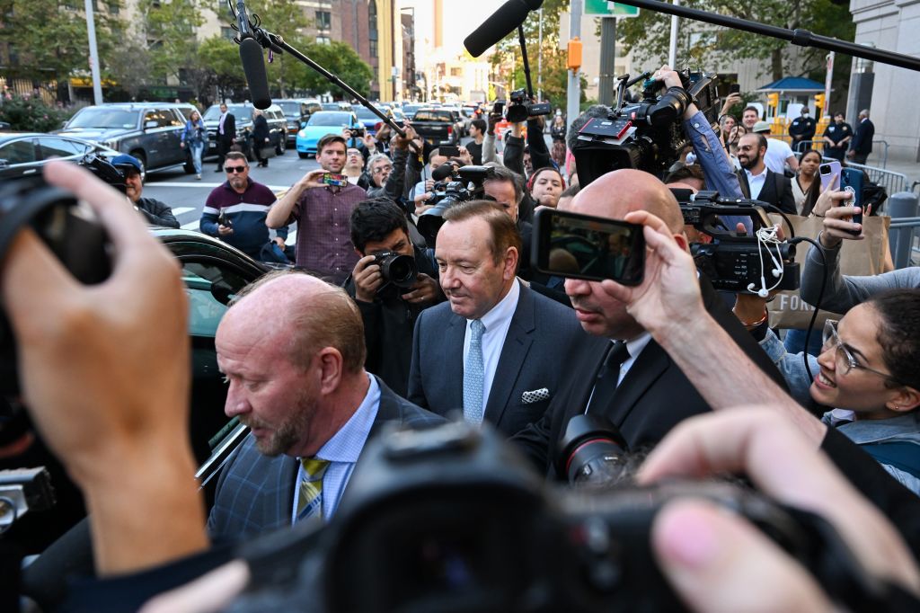 NEW YORK, NEW YORK - OCTOBER 06: Actor Kevin Spacey is surrounded by members of the media and fans as he leaves the US District Courthouse on October 06, 2022 in New York City. Spacey’s trial began today with jury selection after allegations of alleged sexual misconduct surfaced in 2017 by actor Anthony Rapp. (Photo by Alexi J. Rosenfeld/Getty Images
