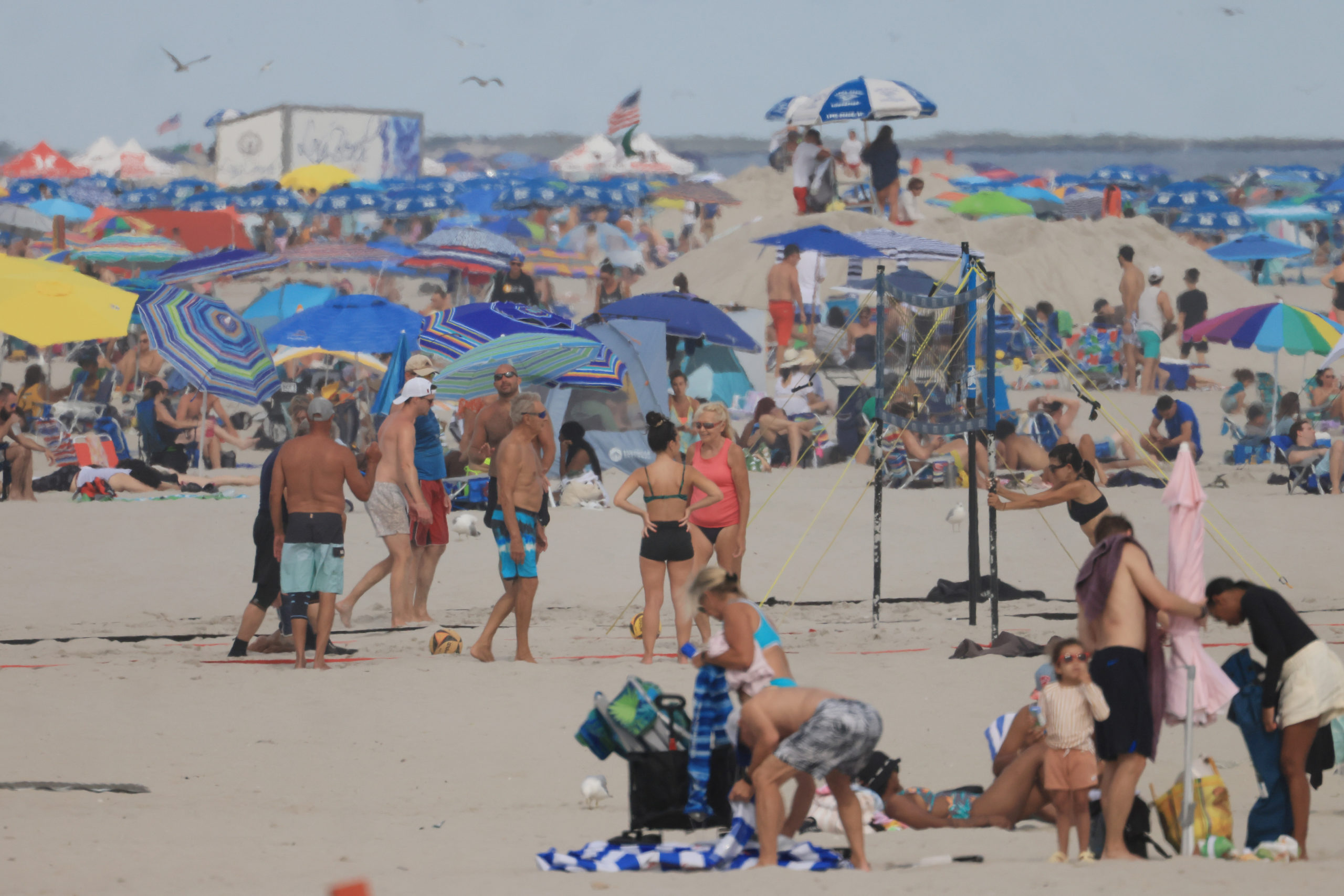 LONG BEACH, NEW YORK - JULY 22: As hot and humid weather continued into the weekend, visitors populated the beach on July 22, 2023 in Long Beach, New York. (Photo by Bruce Bennett/Getty Images)