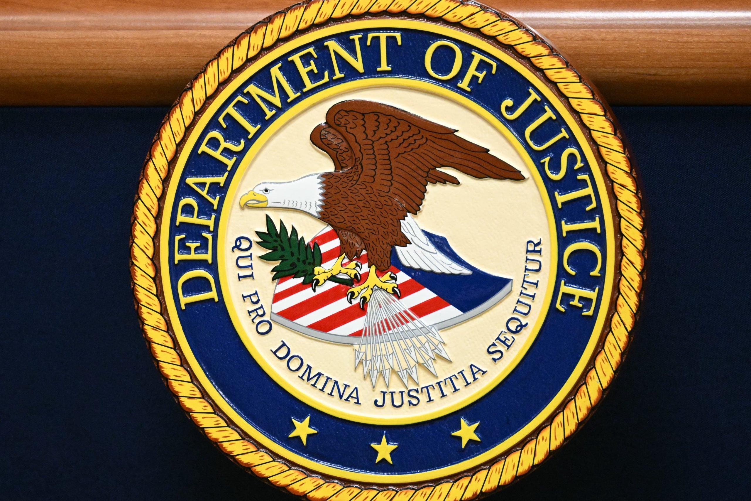 The seal of the US Department of Justice in Washington, DC on March 21, 2024. (Photo by MANDEL NGAN/AFP via Getty Images)