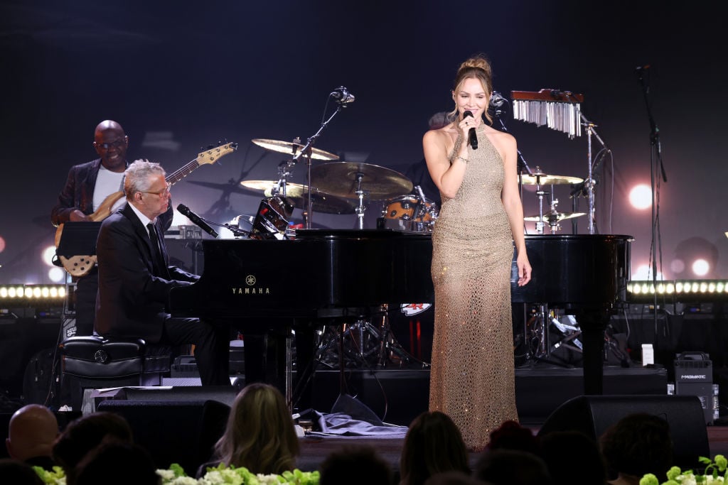 SCOTTSDALE, ARIZONA - APRIL 27: (L-R) David Foster and Katharine McPhee perform onstage during Gateway Celebrity Fight Night 2024 on April 27, 2024 in Scottsdale, Arizona. (Photo by Phillip Faraone/Getty Images for Gateway For Cancer Research)
