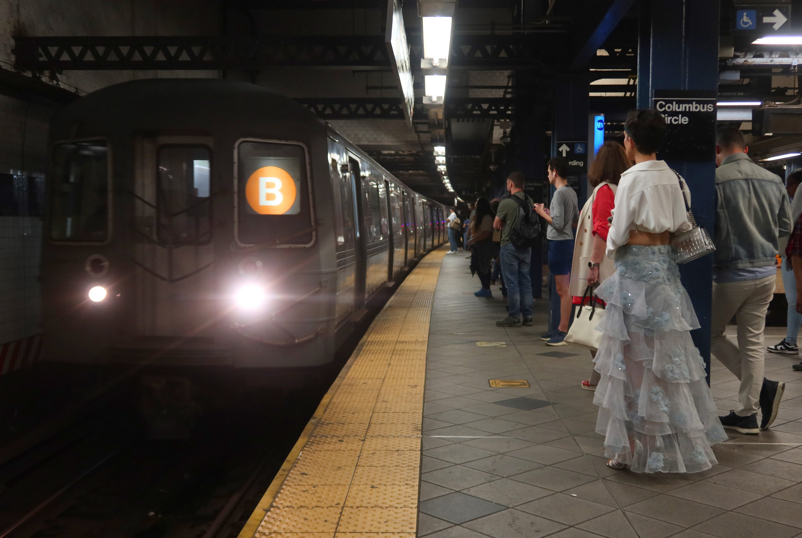 NEW YORK, NY - MAY 29: People wait to board a B-line train at the 59th Street - Columbus Circle subway station on May 29, 2024, in New York City. (Photo by Gary Hershorn/Getty Images)