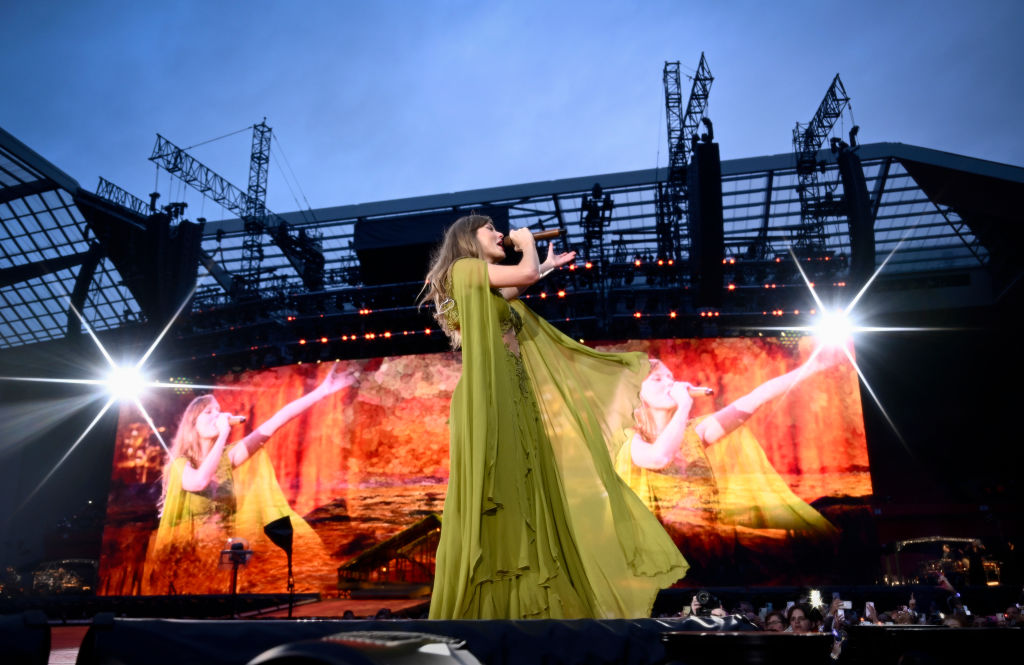 LIVERPOOL, ENGLAND - JUNE 13: EDITORIAL USE ONLY. NO BOOK COVERS. (EDITORS NOTE: Image has been created using a starburst filter) Taylor Swift performs on stage during during "Taylor Swift | The Eras Tour" at Anfield on June 13, 2024 in Liverpool, England. (Photo by Gareth Cattermole/TAS24/Getty Images for TAS Rights Management)