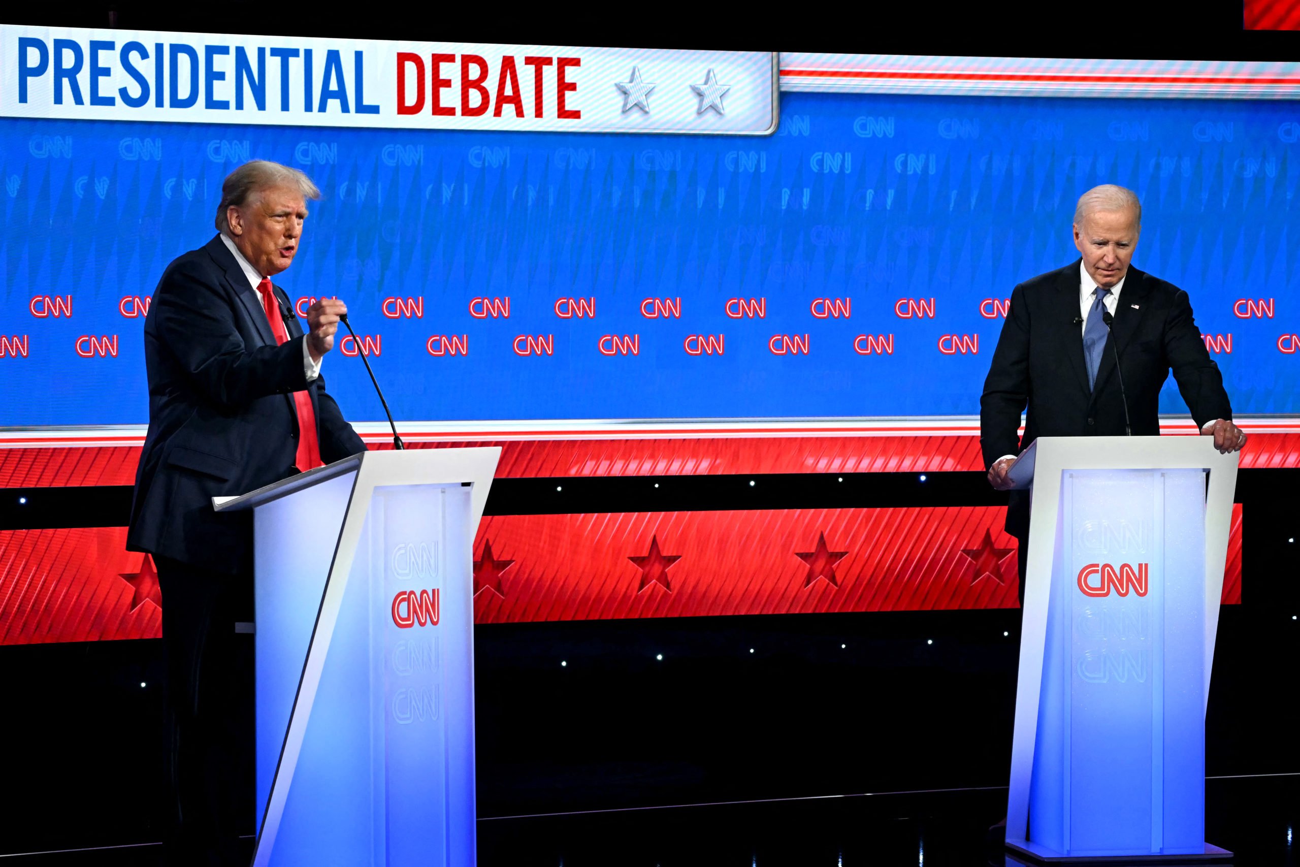 US President Joe Biden and former US President and Republican presidential candidate Donald Trump participate in the first presidential debate of the 2024 elections at CNN's studios in Atlanta, Georgia, on June 27, 2024. (Photo by ANDREW CABALLERO-REYNOLDS / AFP) (Photo by ANDREW CABALLERO-REYNOLDS/AFP via Getty Images)