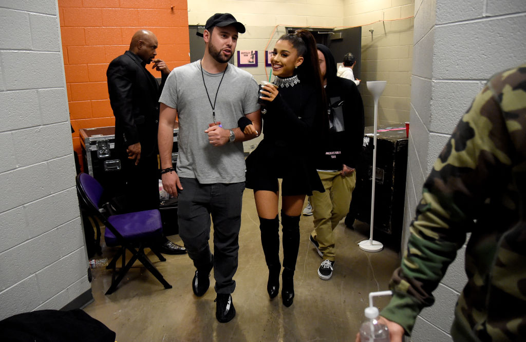 PHOENIX, AZ - FEBRUARY 03: (EXCLUSIVE COVERAGE) Scooter Braun (L) and Ariana Grande walk backstage during the "Dangerous Woman" Tour Opener at Talking Stick Resort Arena on February 3, 2017 in Phoenix, Arizona. (Photo by Kevin Mazur/Getty Images for Live Nation)