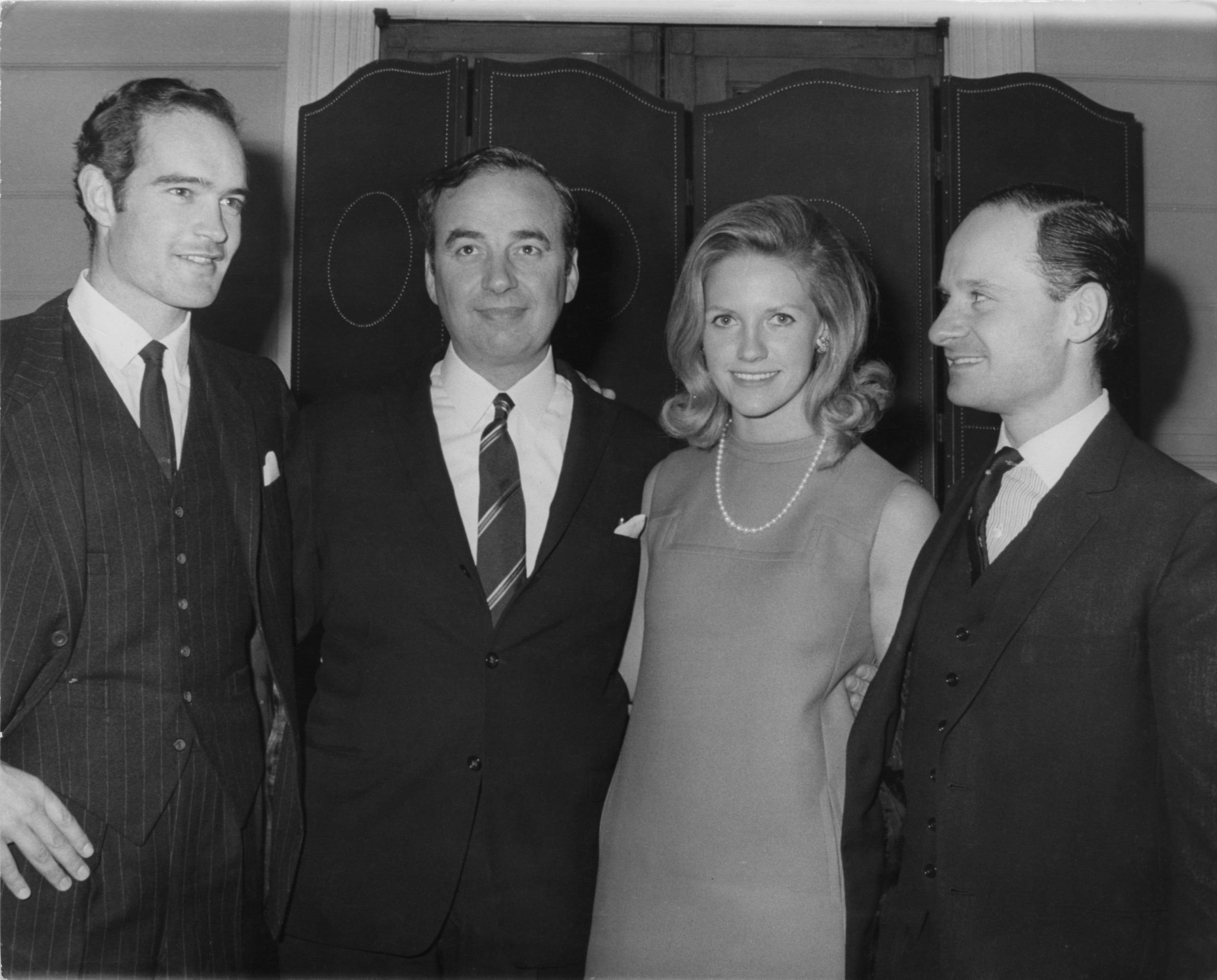 (L-R) Clive Carr, Rupert Murdoch and his wife Anna, and William Carr, during a meeting of 'News of the World' shareholders in London, 2nd January 1969. (Photo by Michael Webb/Keystone/Hulton Archive/Getty Images)