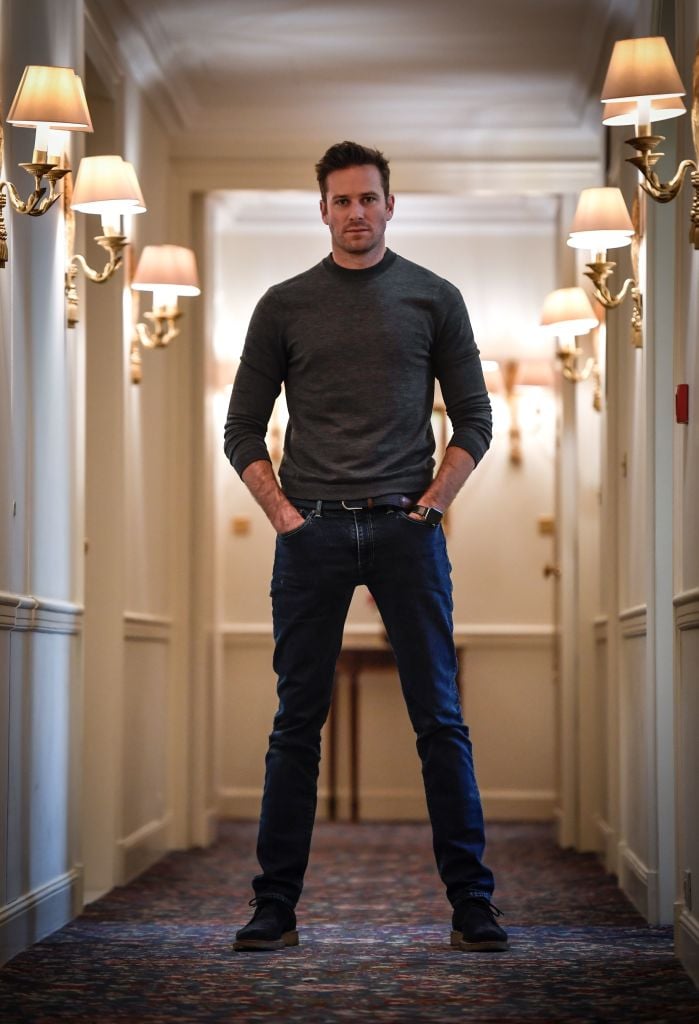 US actor Armie Hammer poses on December 4, 2018 at the Bristol palace hotel in Paris. (Photo by STEPHANE DE SAKUTIN / AFP) (Photo credit should read STEPHANE DE SAKUTIN/AFP via Getty Images)