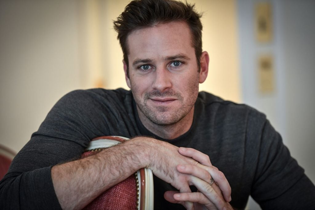 US actor Armie Hammer poses on December 4, 2018 at the Bristol palace hotel in Paris. (Photo by STEPHANE DE SAKUTIN / AFP) (Photo credit should read STEPHANE DE SAKUTIN/AFP via Getty Images)