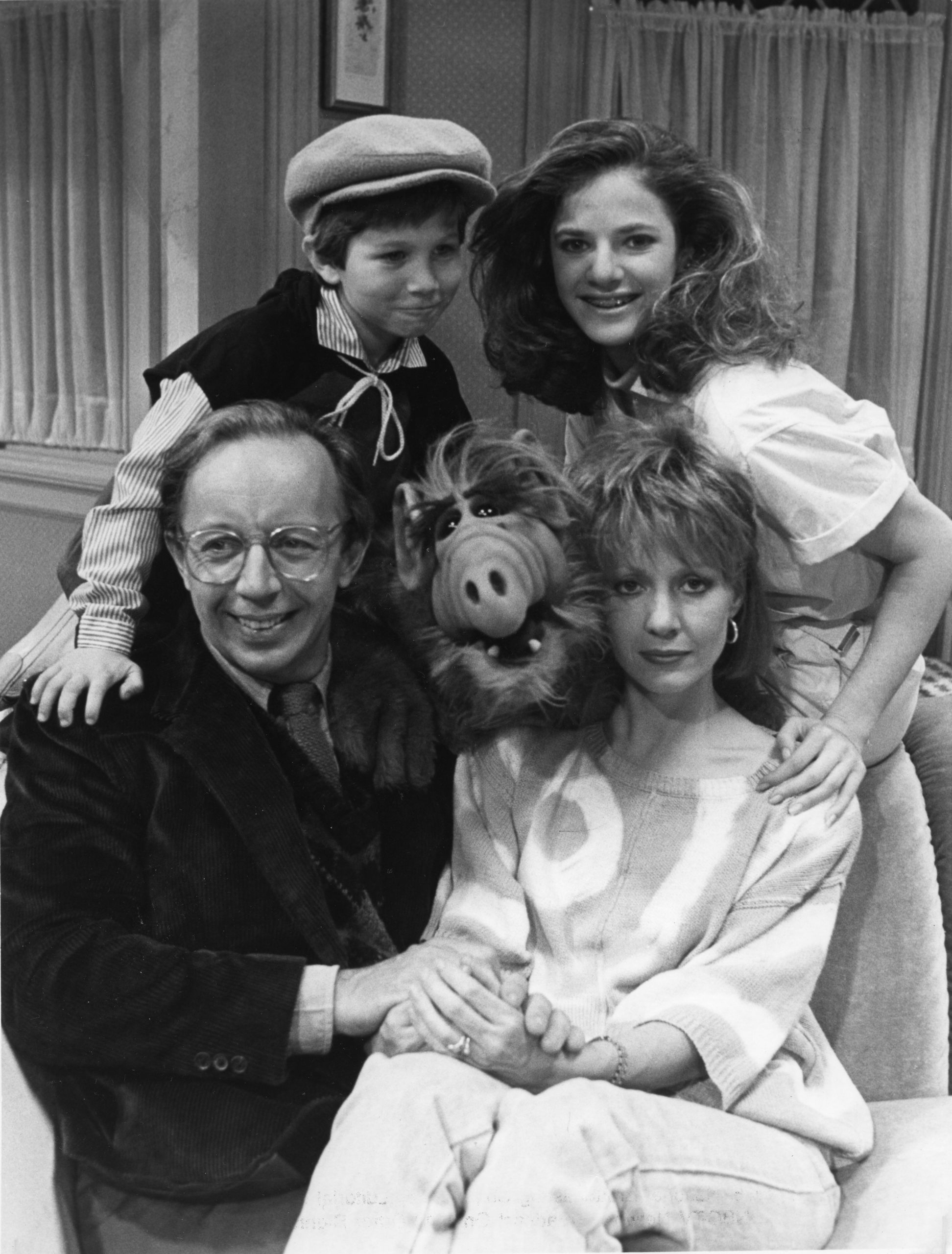 (L-R) Max Wright, Benji Gregory, Andrea Elson, and Anne Shedeen with ALF aka Alien Life Form in still from the TV show "ALF" on May 23, 1986 in Los Angeles, California. (Photo by Michael Ochs Archives/Getty Images)