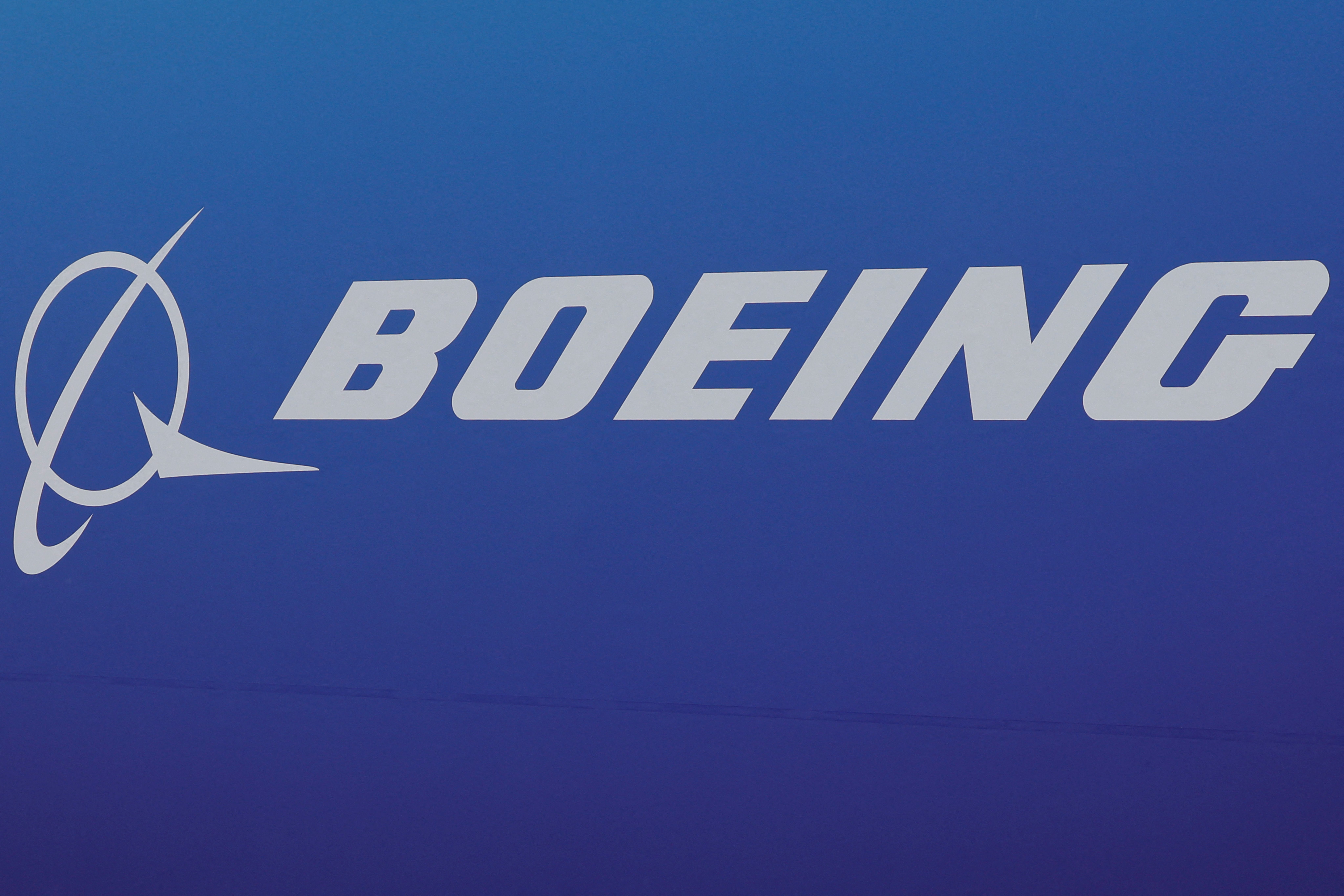 A logo of US aircraft maker Boeing is displayed during the International Paris Air Show at the ParisLe Bourget Airport, on June 20, 2023. (Photo by GEOFFROY VAN DER HASSELT/AFP via Getty Images)