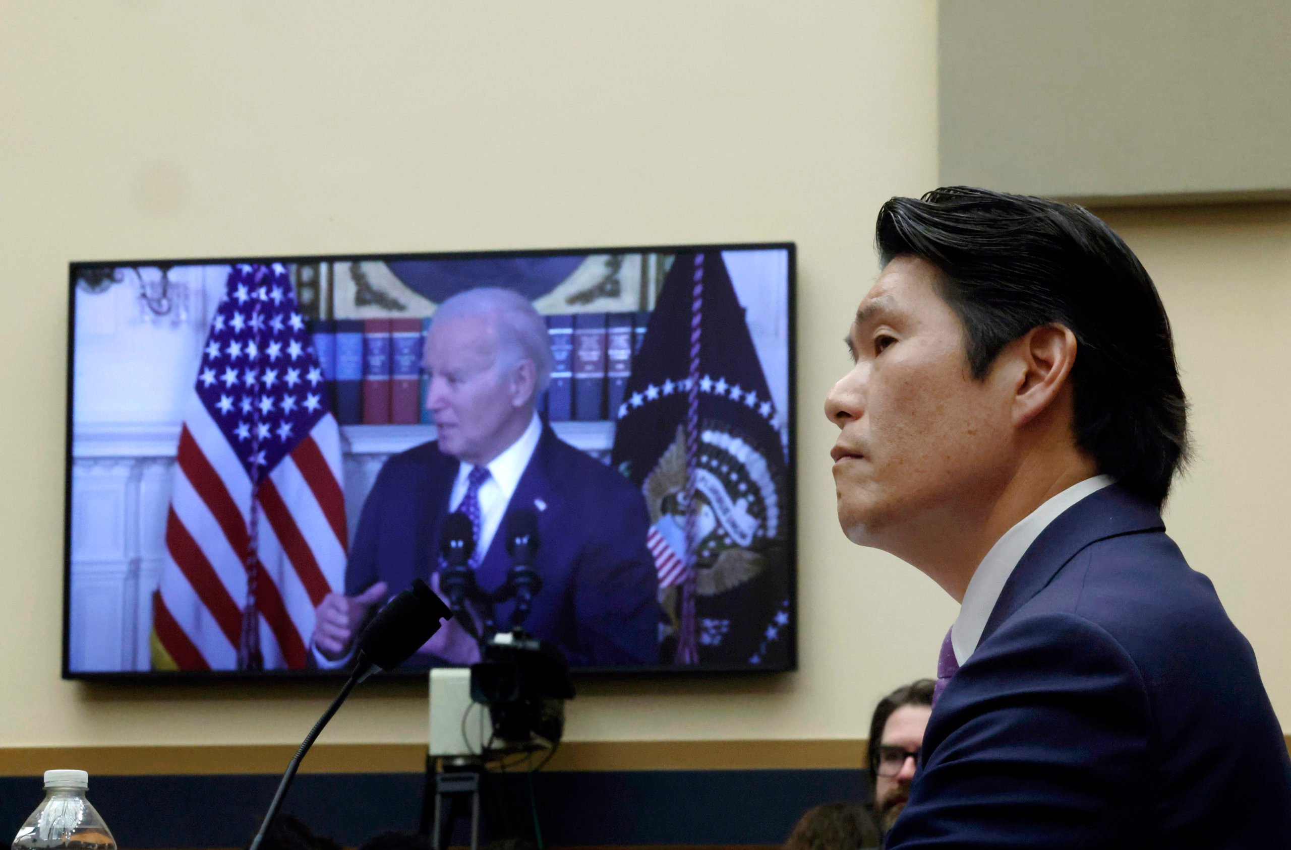 WASHINGTON, DC - MARCH 12: Former Special Counsel Robert K. Hur testifies alongside a video of President Joe Biden before the House Judiciary Committee on March 12, 2024 in Washington, DC. Hur investigated U.S. President Joe Biden’s mishandling of classified documents and published a final report with contentious conclusions about Biden’s memory. (Photo by Chip Somodevilla/Getty Images)