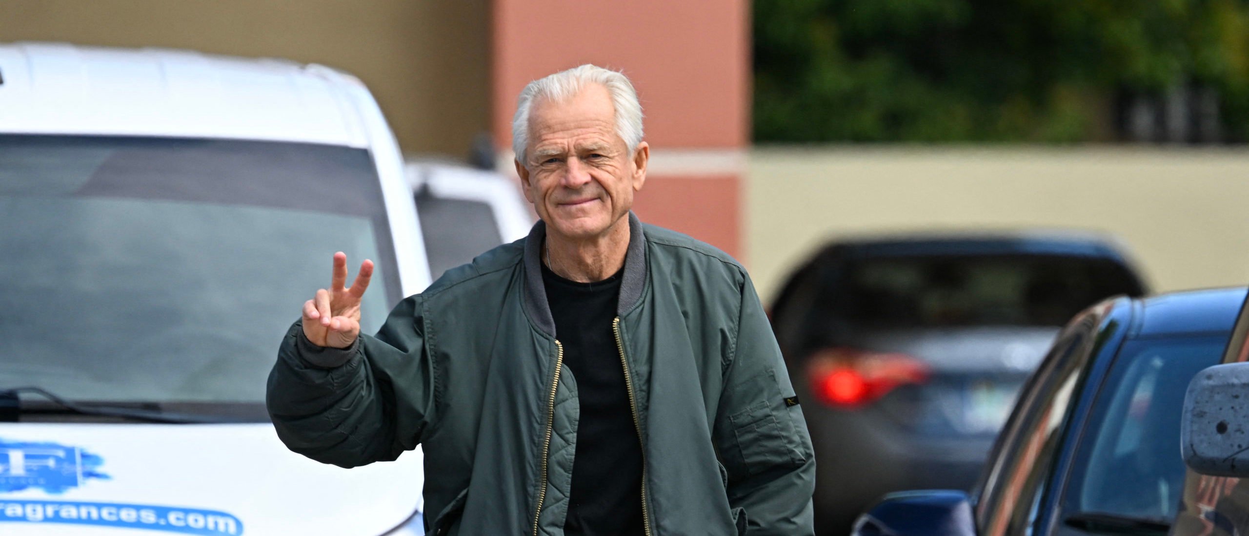 Peter Navarro, White House trade advisor to former US President Donald Trump, arrives to speak to the press at the Country Mall Plaza before reporting to the Federal Correctional Institution, in Miami, Florida on March 19, 2024. Navarro, 74, was found guilty of two counts of contempt in September for refusing to testify before the congressional panel that investigated the January 6, 2021, attack on the US Capitol. (Photo by CHANDAN KHANNA / AFP) (Photo by CHANDAN KHANNA/AFP via Getty Images)
