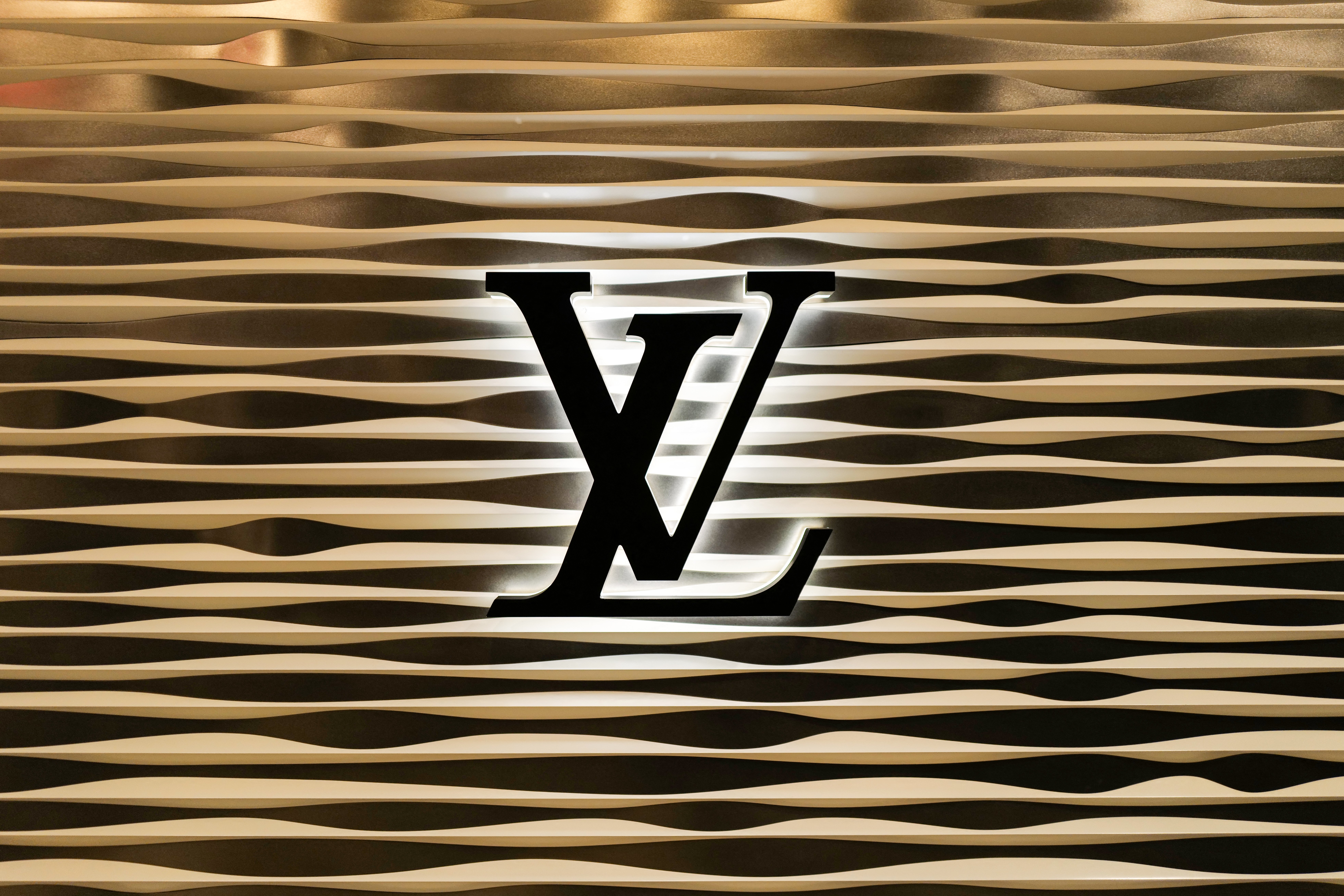 The logo of luxury brand Louis Vuitton is seen in New York City, on April 10, 2024. (Photo by CHARLY TRIBALLEAU/AFP via Getty Images)