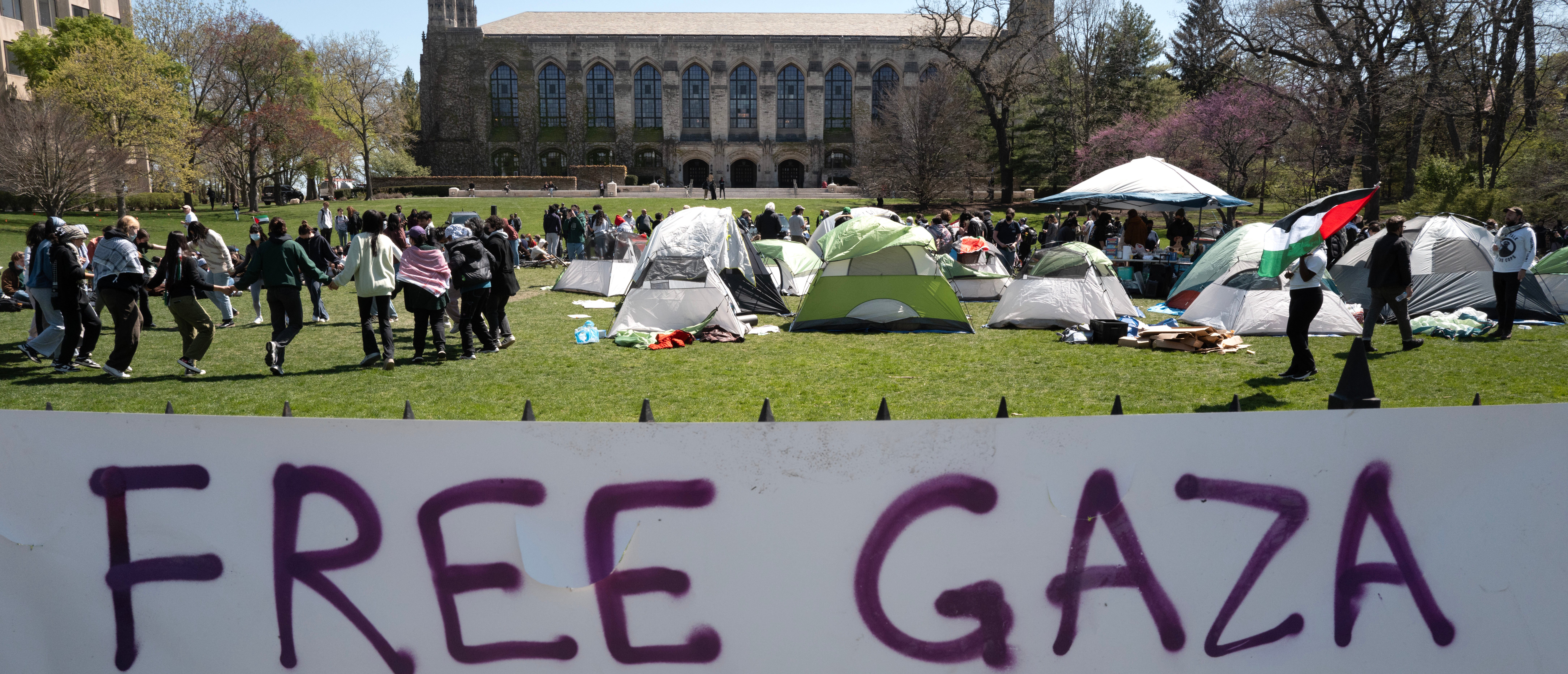 EVANSTON, ILLINOIS - APRIL 25: People rally on the campus of Northwestern University to show support for residents of Gaza on April 25, 2024 in Evanston, Illinois. The rally is among many roiling university campuses across the country in response to the ongoing war in Gaza. (Photo by Scott Olson/Getty Images)