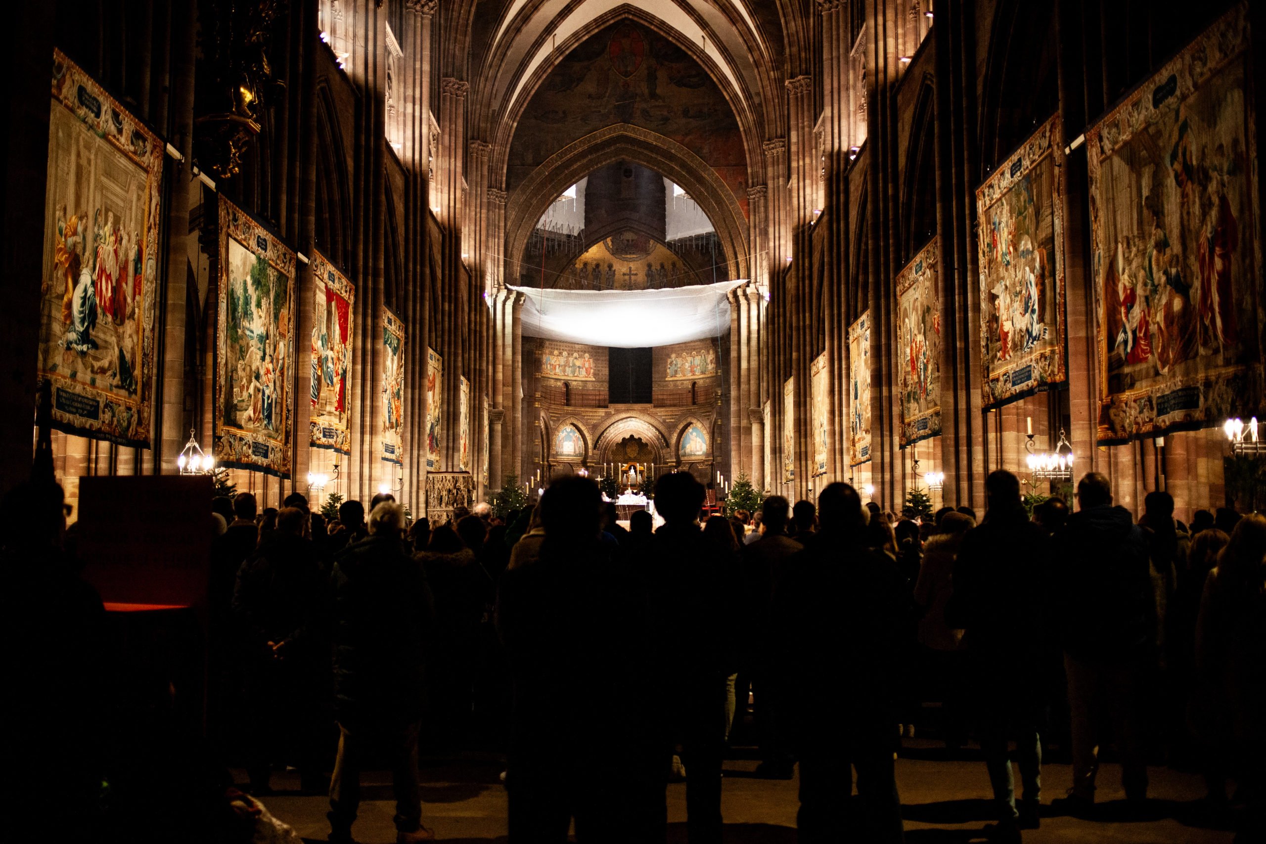 Interior view of the cathedral during the Christmas mass at the Strasbourg Notre Dame Cathedral, in Strasbourg, France, on 24 December 2023. (Photo by OKYANUS KAR SEN/Hans Lucas/AFP via Getty Images)
