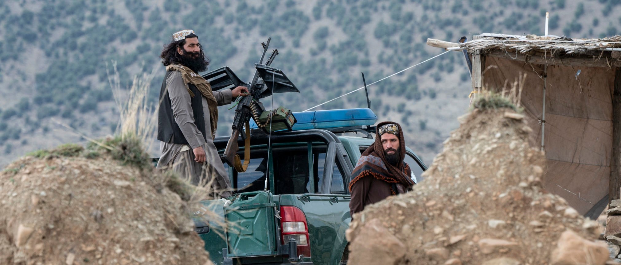 Taliban security personnel standing guard at an outpost in the Zambar area of Sabari district. (Photo by WAKIL KOHSAR/AFP via Getty Images)