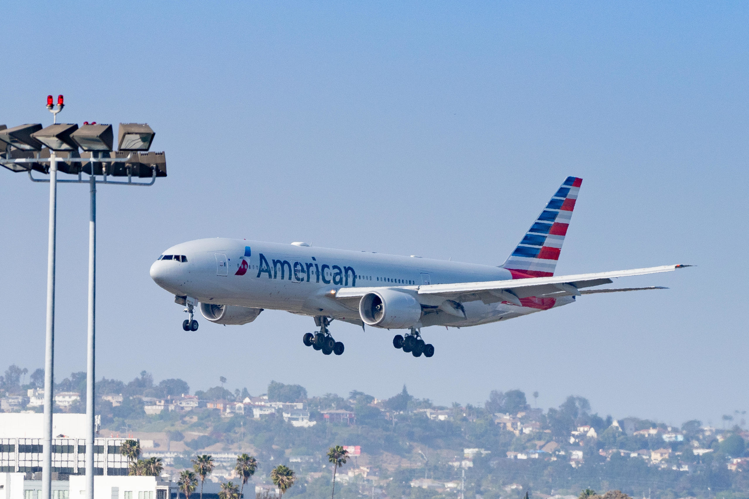 LOS ANGELES, CA - MAY 24: American Airlines Boeing 777-223 arrives at Los Angeles International Airport during Memorial Day weekend on May 24, 2024 in Los Angeles, California. (Photo by AaronP/Bauer-Griffin/GC Images)