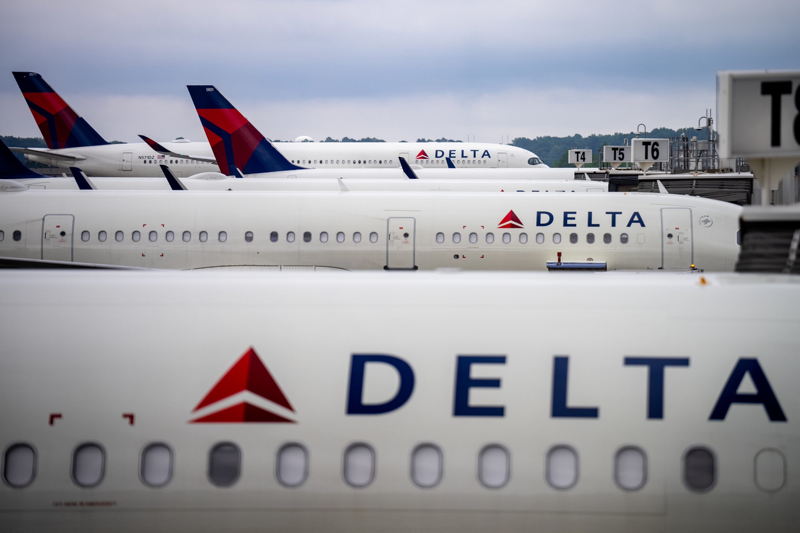 ATLANTA, GEORGIA - JUNE 28: Delta Airlines planes sit parked at Hartsfield-Jackson Atlanta International Airport on June 28, 2024 in Atlanta, Georgia. The Transportation Security Administration (TSA) says they are anticipating a "sustained period of high passenger volumes" that will break previous travel records. (Photo by Andrew Harnik/Getty Images)