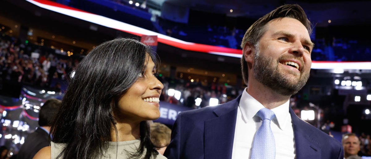 MILWAUKEE, WISCONSIN - JULY 15: U.S. Sen. J.D. Vance (R-OH) and his wife Usha Chilukuri Vance look on as he is nominated for the office of Vice President on the first day of the Republican National Convention at the Fiserv Forum on July 15, 2024 in Milwaukee, Wisconsin. Delegates, politicians, and the Republican faithful are in Milwaukee for the annual convention, concluding with former President Donald Trump accepting his party's presidential nomination. The RNC takes place from July 15-18. (Photo by Anna Moneymaker/Getty Images)