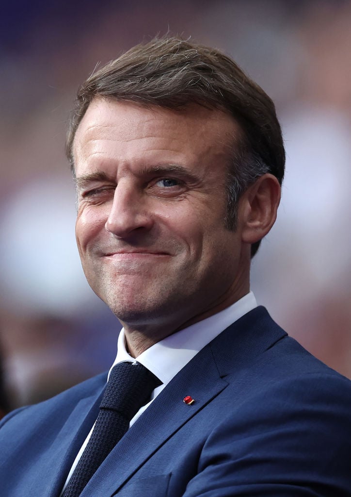 PARIS, FRANCE - JULY 27: Emmanuel Macron, President of France interact prior to the Men’s Rugby Sevens Gold Medal match between France and Fiji on day one of the Olympic Games Paris 2024 at Stade de France on July 27, 2024 in Paris, France. (Photo by Hannah Peters/Getty Images)