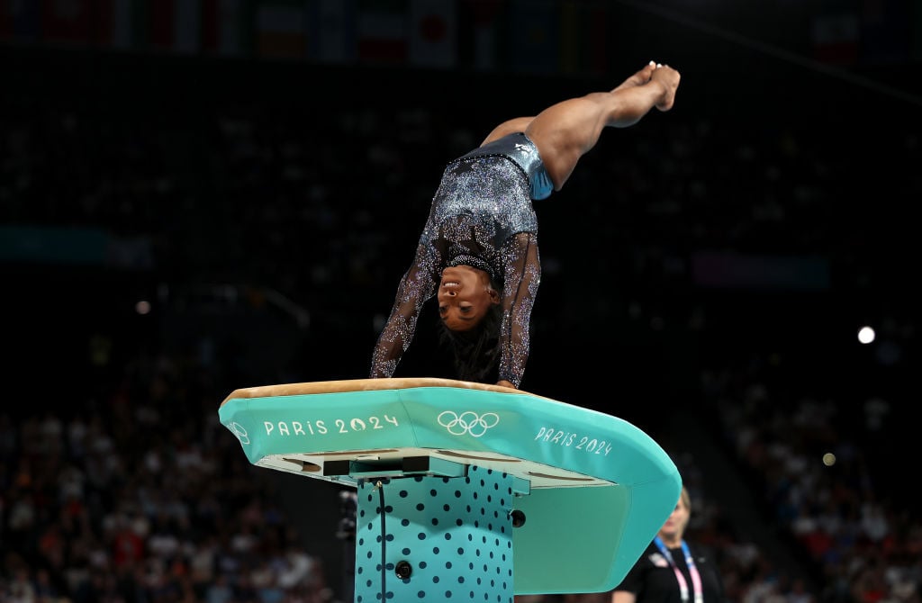 PARIS, FRANCE - JULY 28: Simone Biles of Team United States competes on the vault during the Artistic Gymnastics Women's Qualification on day two of the Olympic Games Paris 2024 at Bercy Arena on July 28, 2024 in Paris, France. (Photo by Jamie Squire/Getty Images)