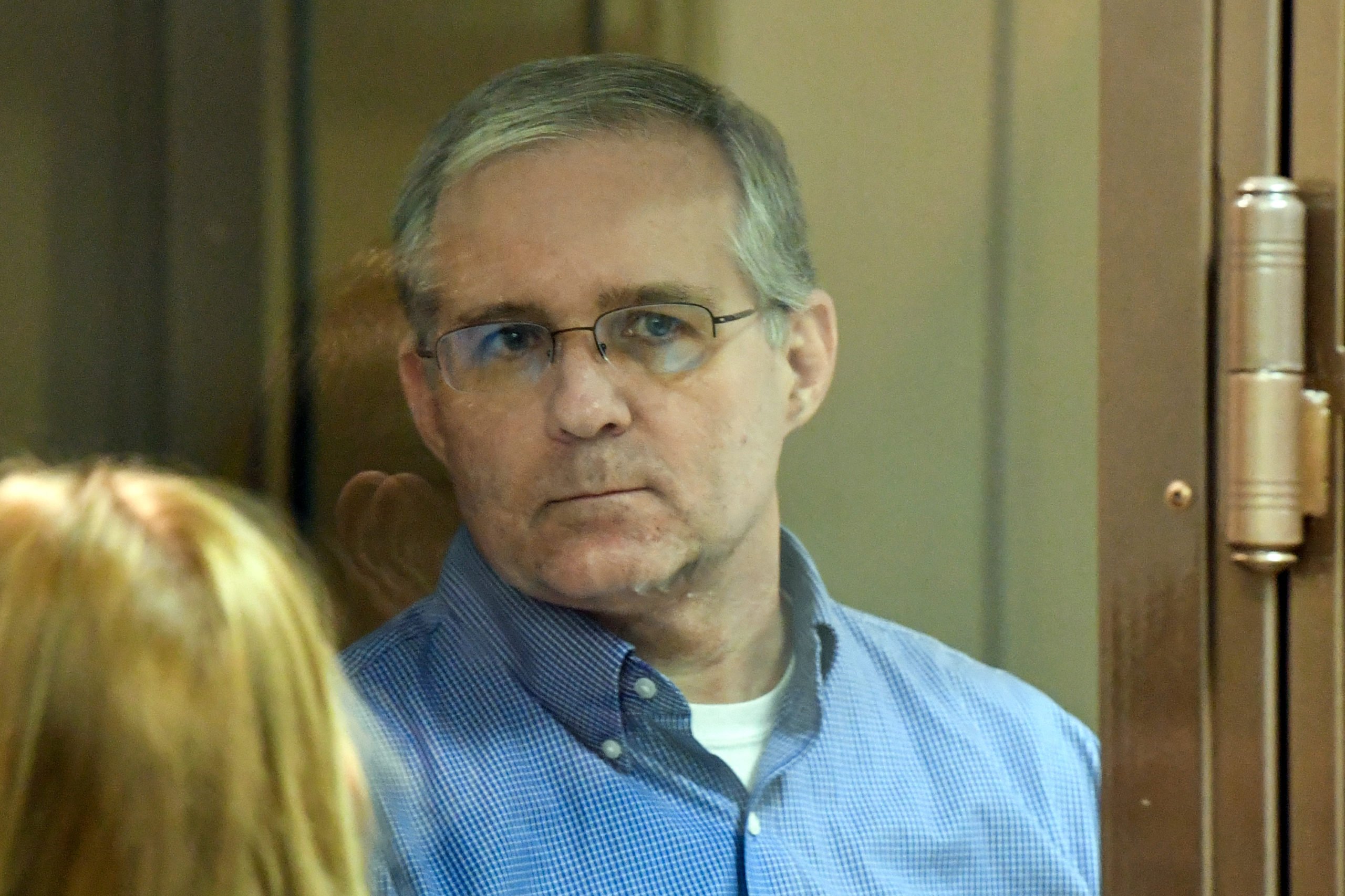 Paul Whelan, a former US Marine accused of espionage and arrested in Russia, stands inside a defendants' cage during a hearing at a court in Moscow on January 22, 2019. (Photo credit MLADEN ANTONOV/AFP via Getty Images)