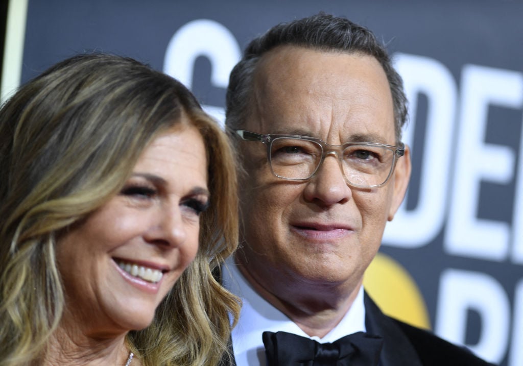 US actor Tom Hanks and wife Rita Wilson arrive for the 77th annual Golden Globe Awards on January 5, 2020, at The Beverly Hilton hotel in Beverly Hills, California. (Photo by VALERIE MACON / AFP) (Photo by VALERIE MACON/AFP via Getty Images)
