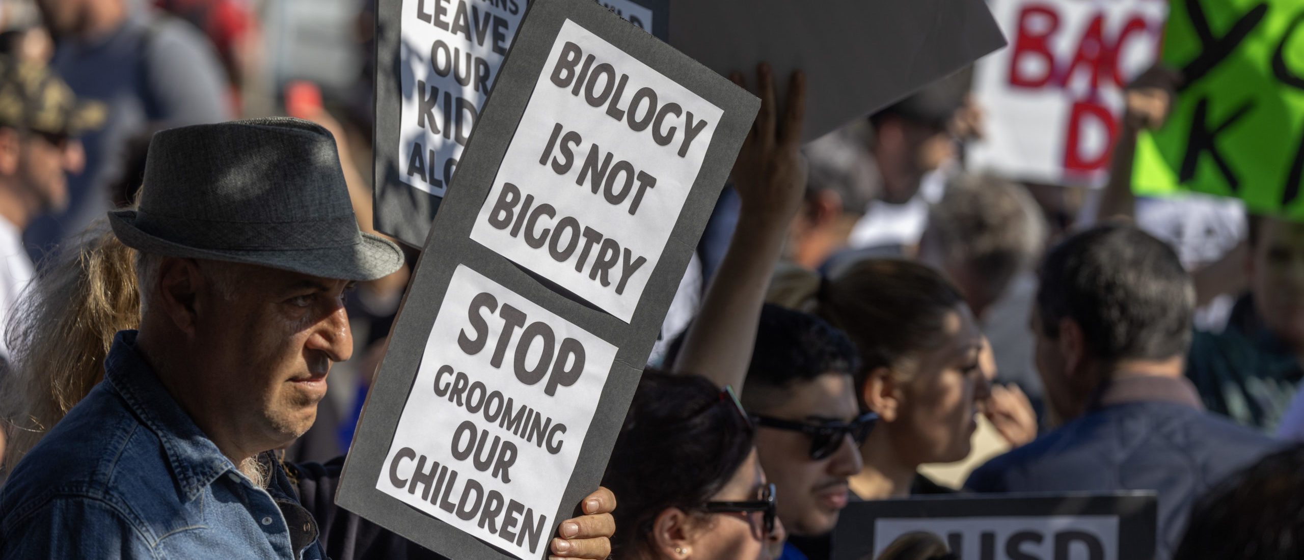 GLENDALE, CALIFORNIA - JUNE 20: Anti-LGBTQ+ demonstrators rally outside a Glendale Unified School District (GUSD) Board of Education meeting on June 20, 2023 in Glendale, California. Coming two weeks after another GUSD board meeting where a motion was discussed to recognize June as Pride Month sparked violent protests, police were out in force to keep the sides separated. (Photo by David McNew/Getty Images)