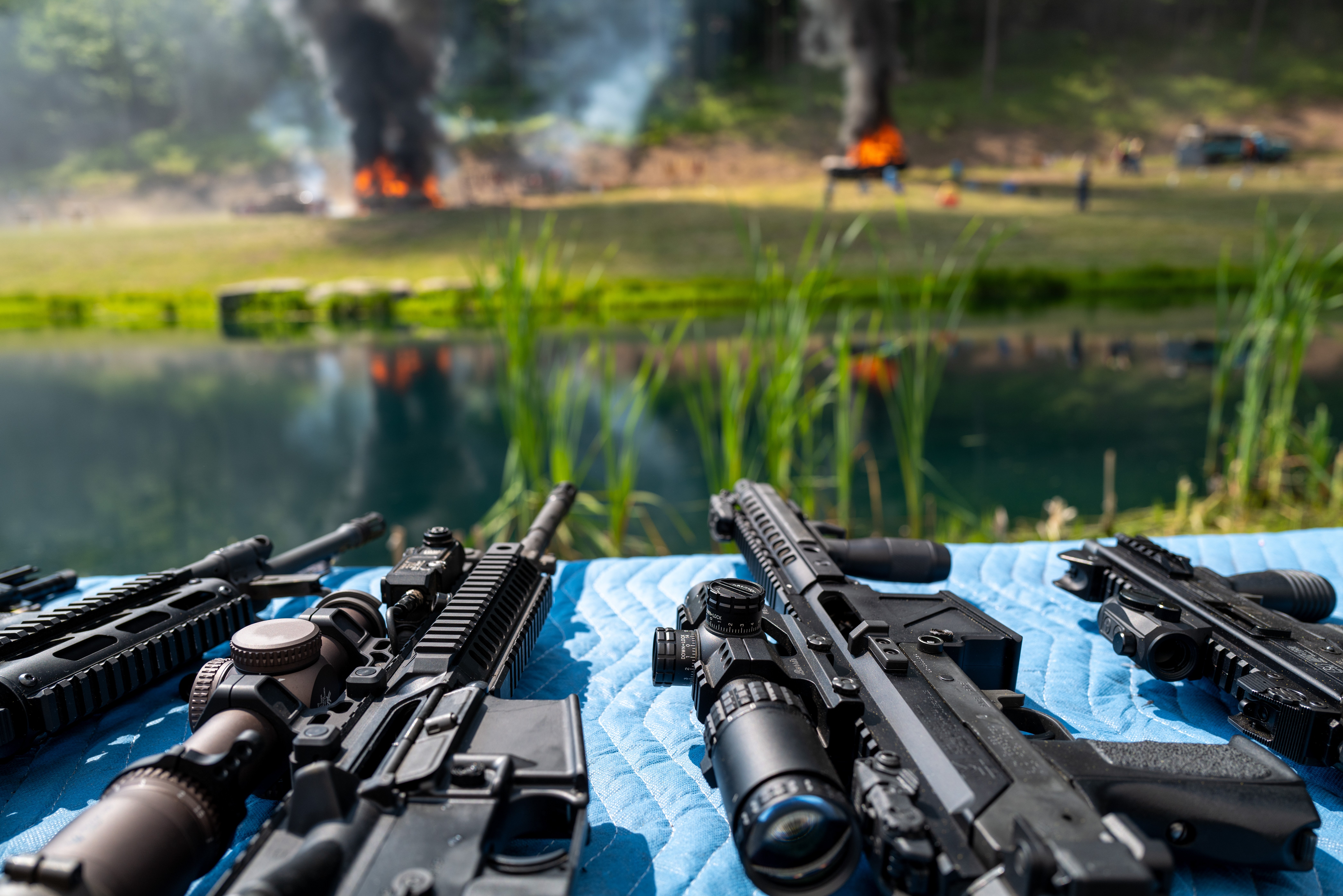 MONROE, PENNSYLVANIA - JUNE 03: Guns are displayed as gun enthusiasts attend the annual Machine Gun Shoot sponsored by Shooters Gauntlet on June 03, 2023 in Monroe, Pennsylvania. The shoot, which has been held since 2016, lets members of the public and others shoot machine guns at targets in a controlled and secure wooded location. The two-day event features raffles, workshops, vendors and opportunities to rent and fire a variety of weapons. According to recent data, in 2021 Americans bought an estimated 19 million guns. (Photo by Spencer Platt/Getty Images)