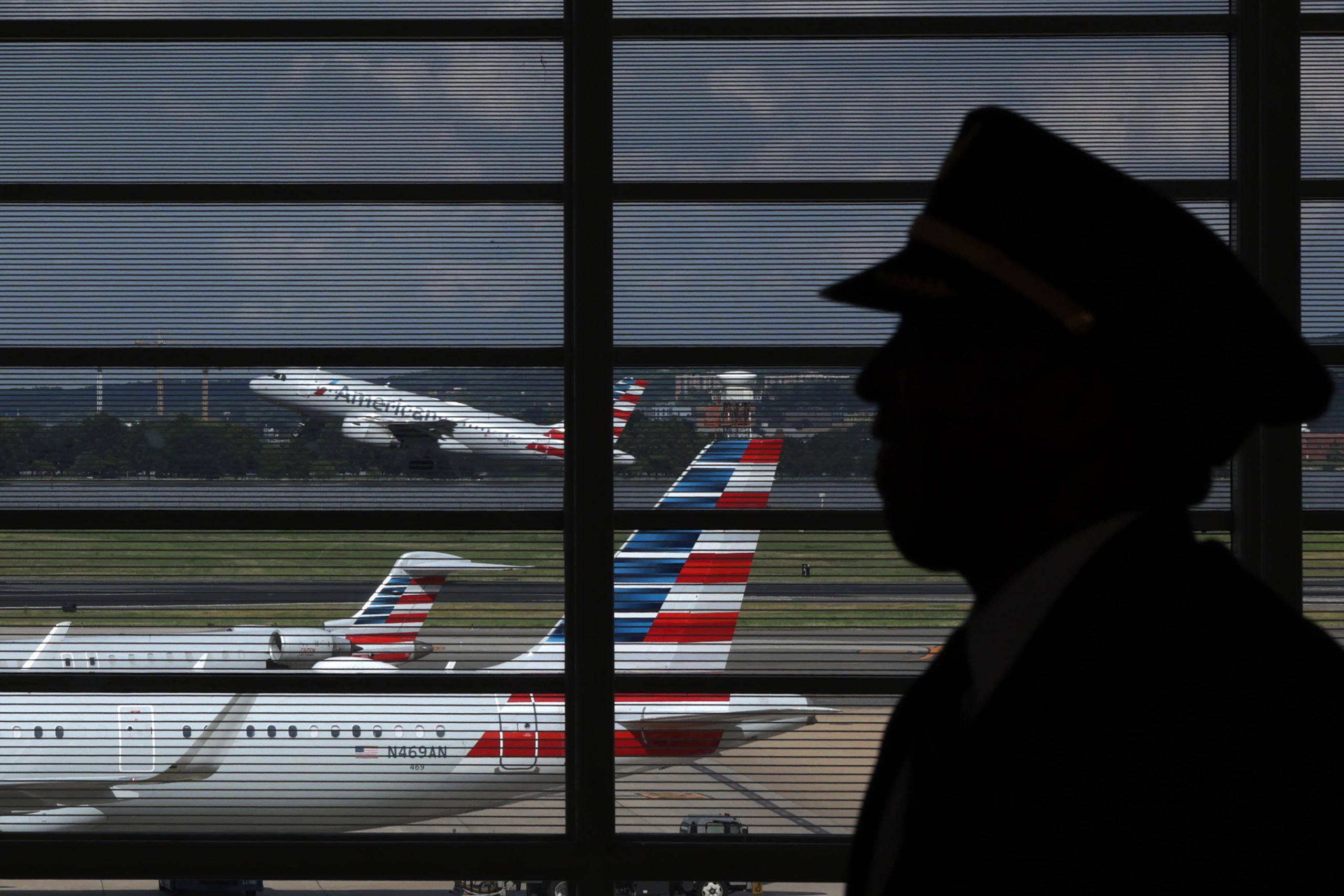 WASHINGTON, DC - JULY 10: An American Airlines flight takes off from Ronald Reagan Washington National Airport on July 10, 2023 in Washington, DC. Senate Democrats from the Washington, D.C., region held a news conference "to call on Congress not to meddle with the safety and operations" of Ronald Reagan Washington National Airport, "by making changes to the slot and perimeter rules in the upcoming reauthorization of the Federal Aviation Administration (FAA)." (Photo by Alex Wong/Getty Images)