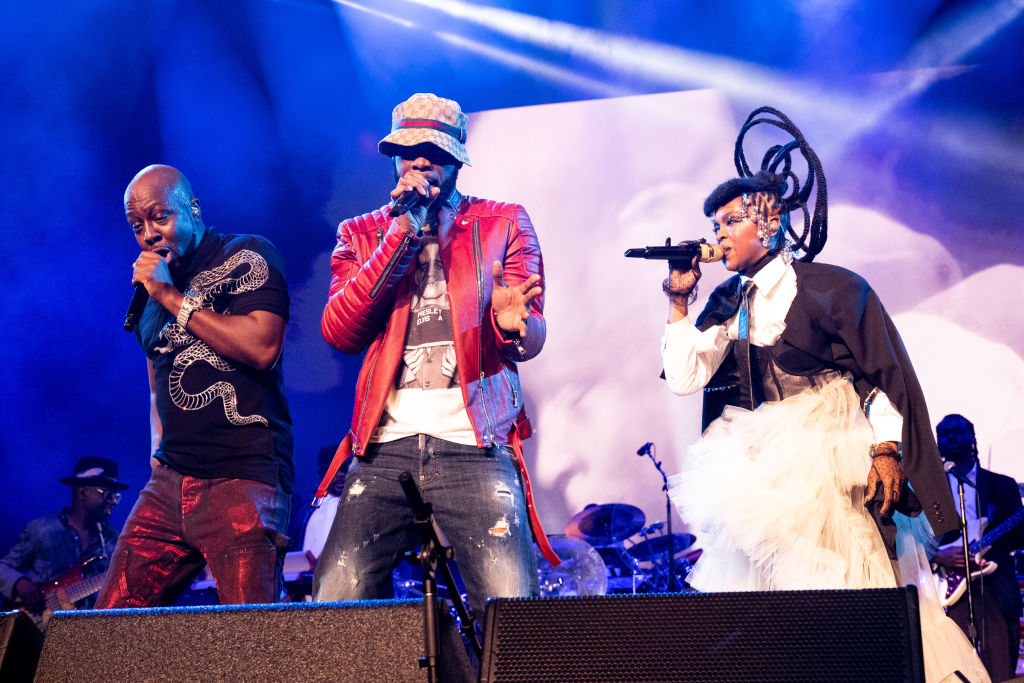 LOS ANGELES, CALIFORNIA - NOVEMBER 04: (L-R) Singers Wyclef Jean, Pras Michel and Ms. Lauryn Hill perform onstage with The Fugees at Crypto.com Arena on November 04, 2023 in Los Angeles, California. (Photo by Scott Dudelson/Getty Images)