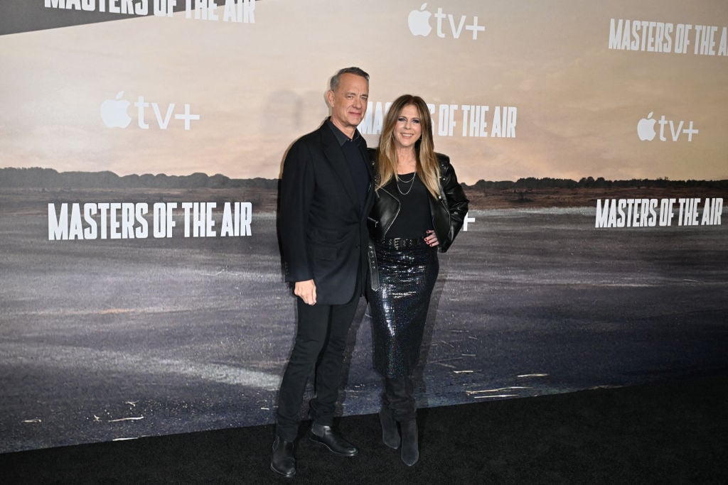 Executive producer Tom Hanks and his wife actress Rita Wilson arrive for Apple TV+ series premiere of "Masters of the Air" at the Village Theatre in Westwood, California, on January 10, 2024. (Photo by Robyn Beck / AFP) (Photo by ROBYN BECK/AFP via Getty Images)
