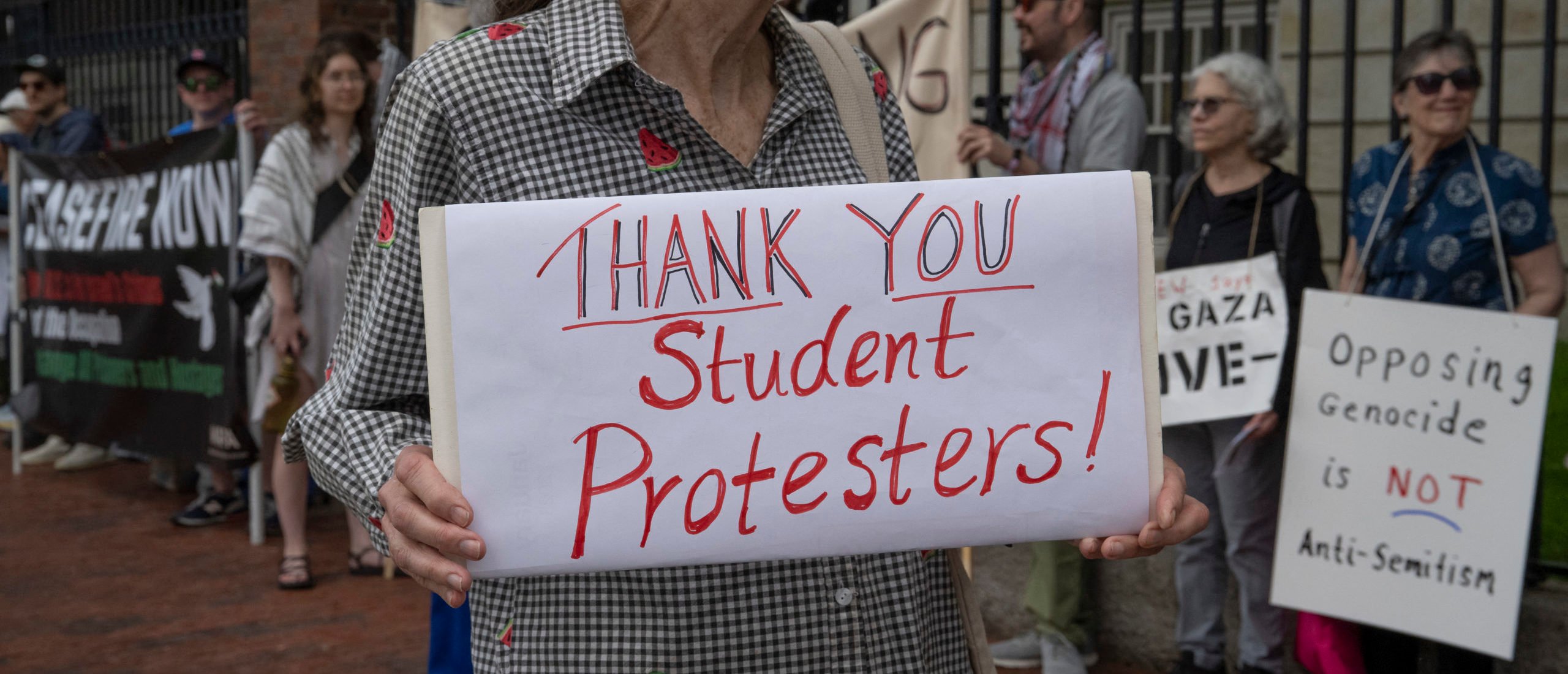 Pro-Palestinian demonstrators protest outside Harvard Yard during Harvard University's class of 2024 graduation ceremony in Cambridge, Massachusetts on May 23, 2024. (Photo by Rick Friedman / AFP) (Photo by RICK FRIEDMAN/AFP via Getty Images)