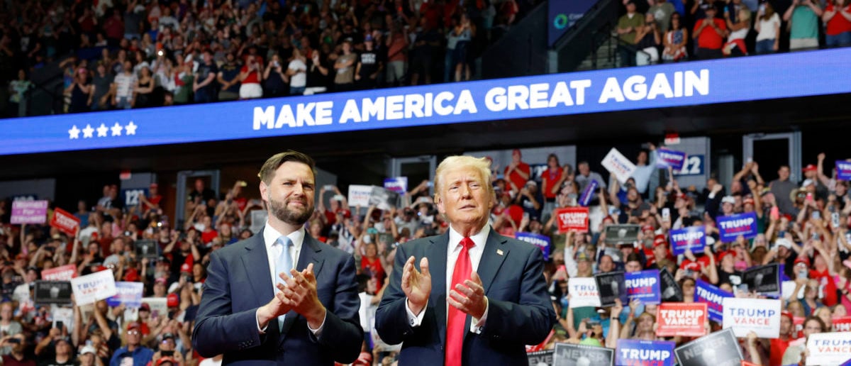 GRAND RAPIDS, MICHIGAN - JULY 20: Republican presidential nominee, former U.S. President Donald Trump stands onstage with Republican vice presidential candidate, Sen. J.D. Vance (R-OH) during a campaign rally at the Van Andel Arena on July 20, 2024 in Grand Rapids, Michigan. Trump's campaign event is the first joint event with Vance and the first campaign rally since the attempted assassination attempt his rally in Butler, Pennsylvania. (Photo by Anna Moneymaker/Getty Images)