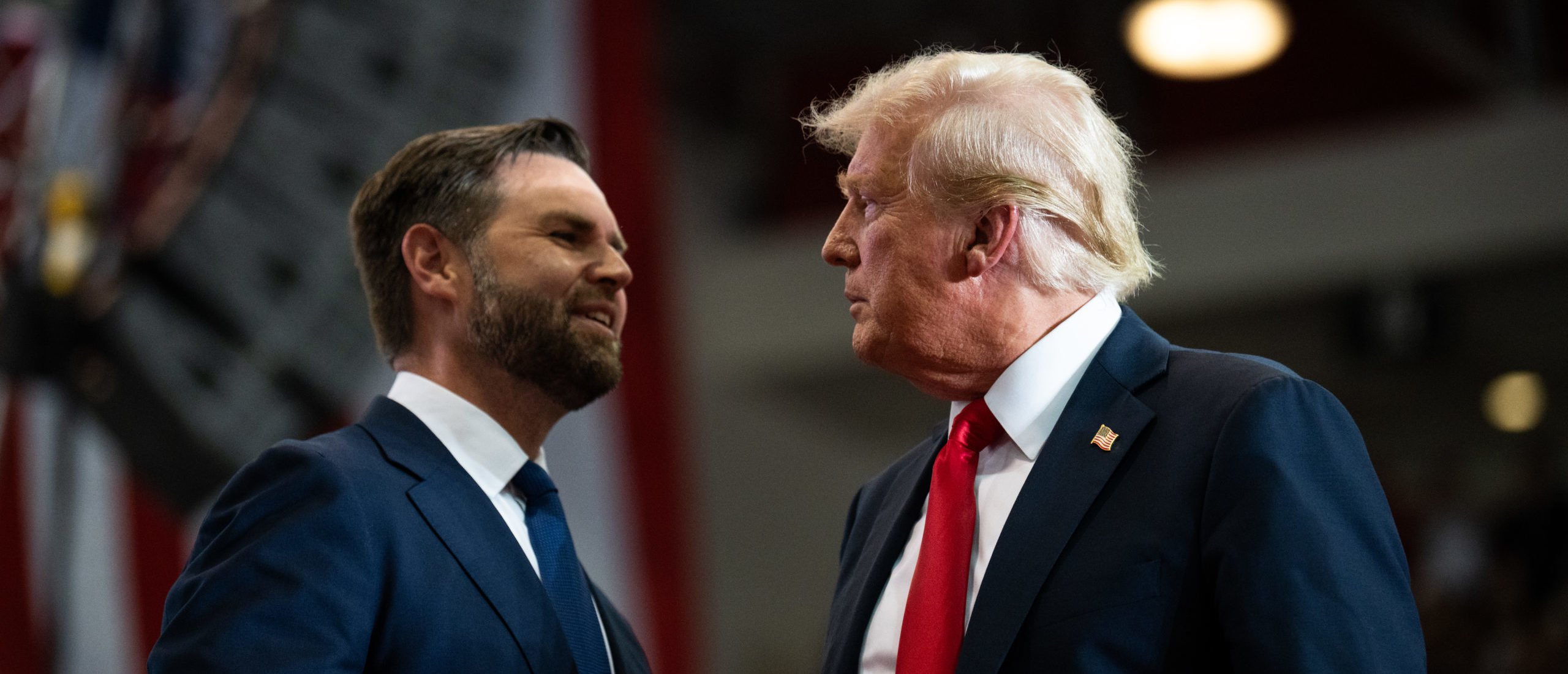 ST CLOUD, MINNESOTA - JULY 27: Republican vice presidential nominee U.S. Sen. J.D. Vance (R-OH) introduces U.S. Republican Presidential nominee former President Donald Trump during a rally at Herb Brooks National Hockey Center on July 27, 2024 in St Cloud, Minnesota. Trump hopes to flip the state of Minnesota this November, which hasn't been carried by a Republican in a presidential election since 1972. Stephen Maturen/Getty Images