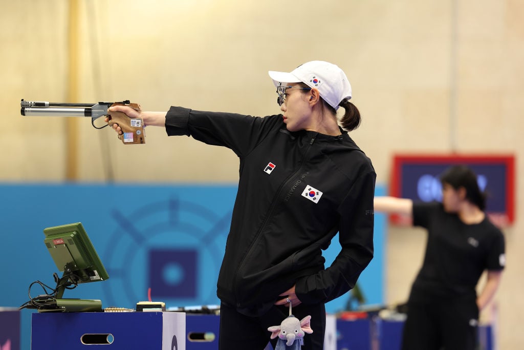 CHATEAUROUX, FRANCE - JULY 28: Kim Yeji of Team Republic of Korea shoots during the Women's 10m Air Pistol Final on day two of the Olympic Games Paris 2024 at Chateauroux Shooting Centre on July 28, 2024 in Chateauroux, France. (Photo by Charles McQuillan/Getty Images)